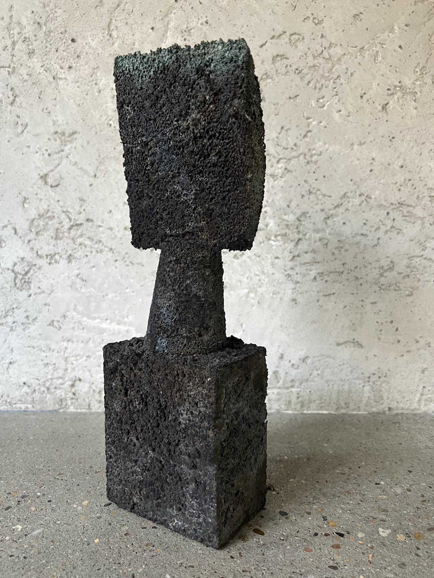 Artist: Elliot Bergman
A sculpture of primitive forms based on African artifacts and mid-century art forms
