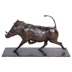 Contemporary Bronze Sculpture of a Trotting Warthog by Jenna Gearing