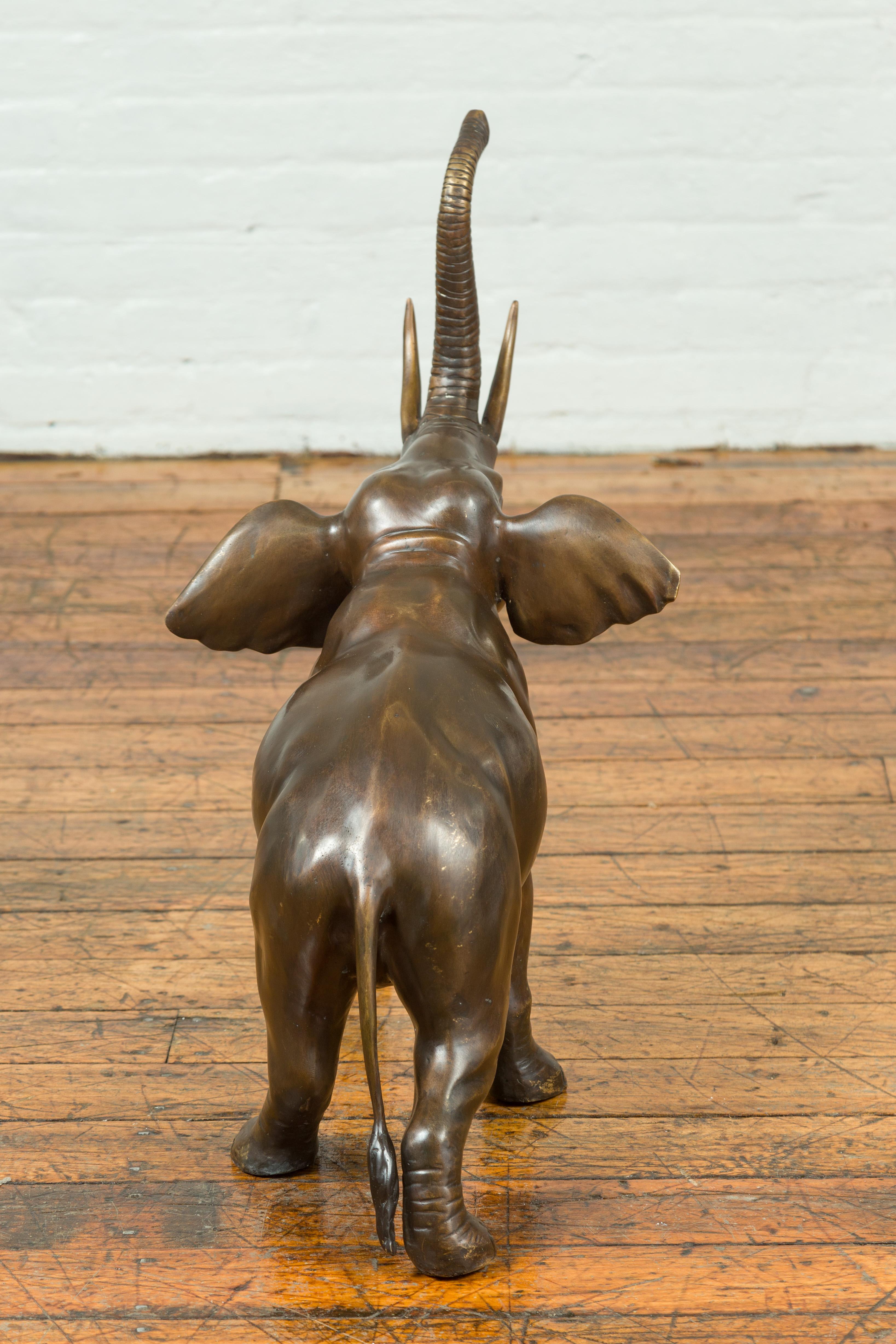 Contemporary Bronze Sculpture of a Trumpeting Elephant with Trunk Up For Sale 2