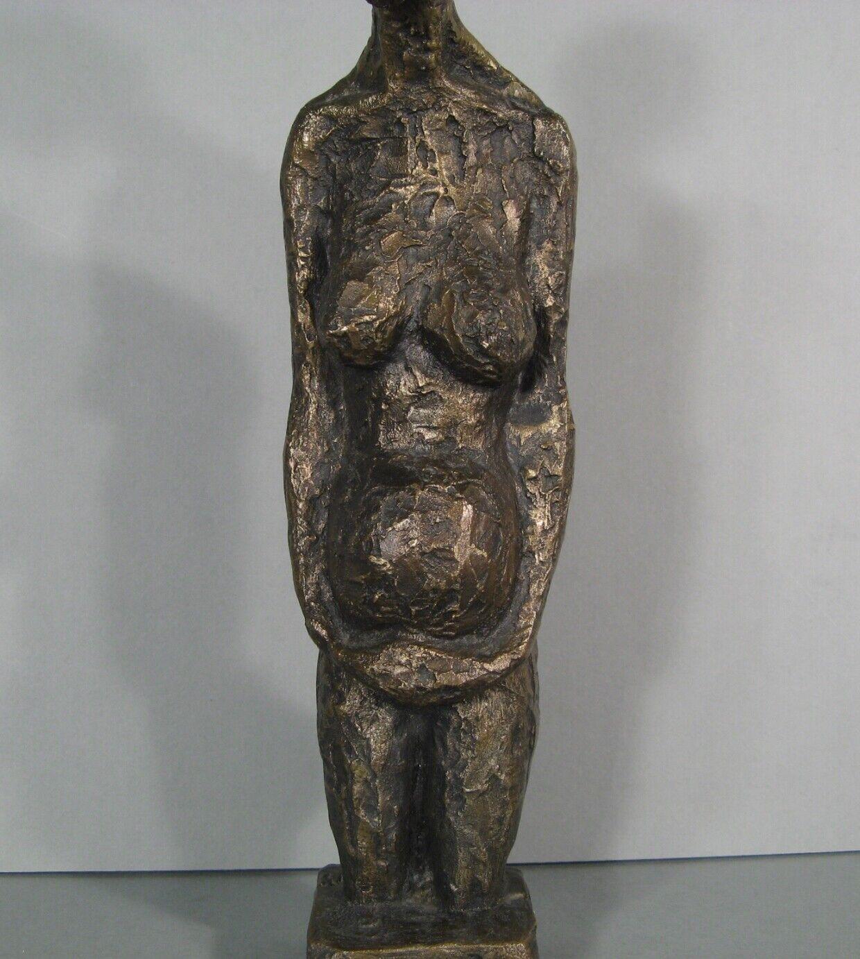 Enhance your collection with this exquisite contemporary bronze sculpture by renowned artist Paul Juvin. This captivating piece, crafted in the second half of the 20th century, depicts a nude pregnant woman, capturing the beauty and grace of
