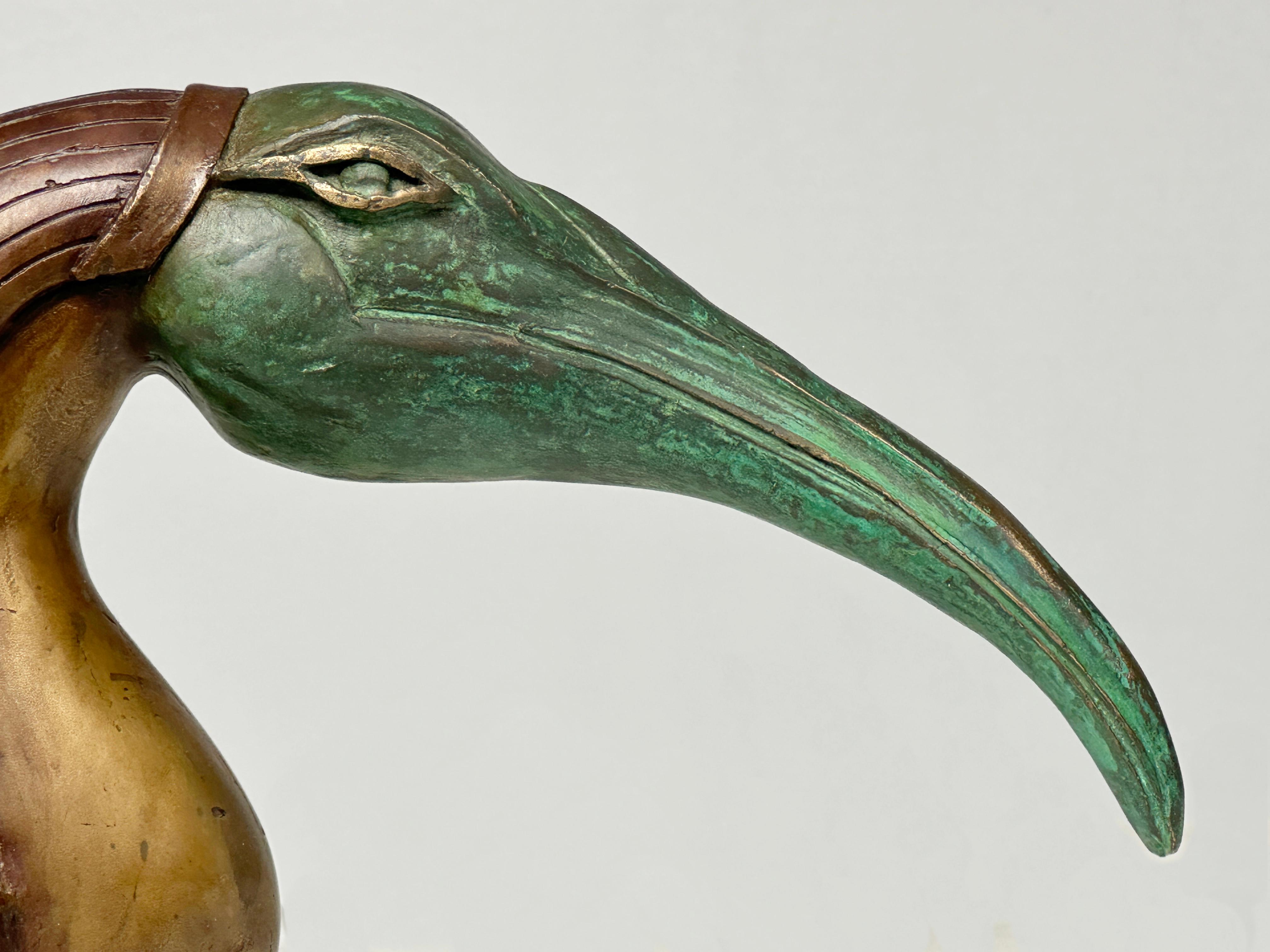 Timeless Seer captures the essence of the Ibis, revered for its wisdom and enigmatic presence. With an elegantly elongated beak and serene expression, this bronze sculpture stands as a quiet guardian, inviting viewers to reflect on nature’s enduring