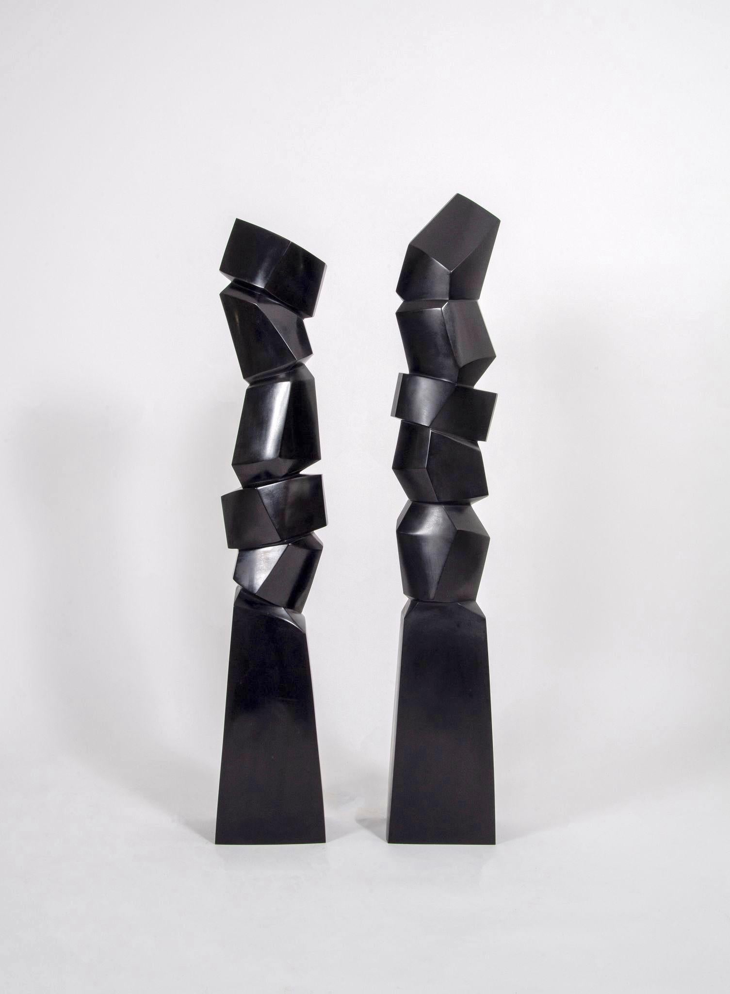 Louanges I & II by Bertrand Créac'h
Material: Bonze, black patina
Dimensions: H 109 x 19 x 14 cm / H 114 x 17 x 16 cm
Year: 2021
Type: Limited edition 2/8 + 4 AP, signed

These sculptures represent an abstracted exploration of the mineral