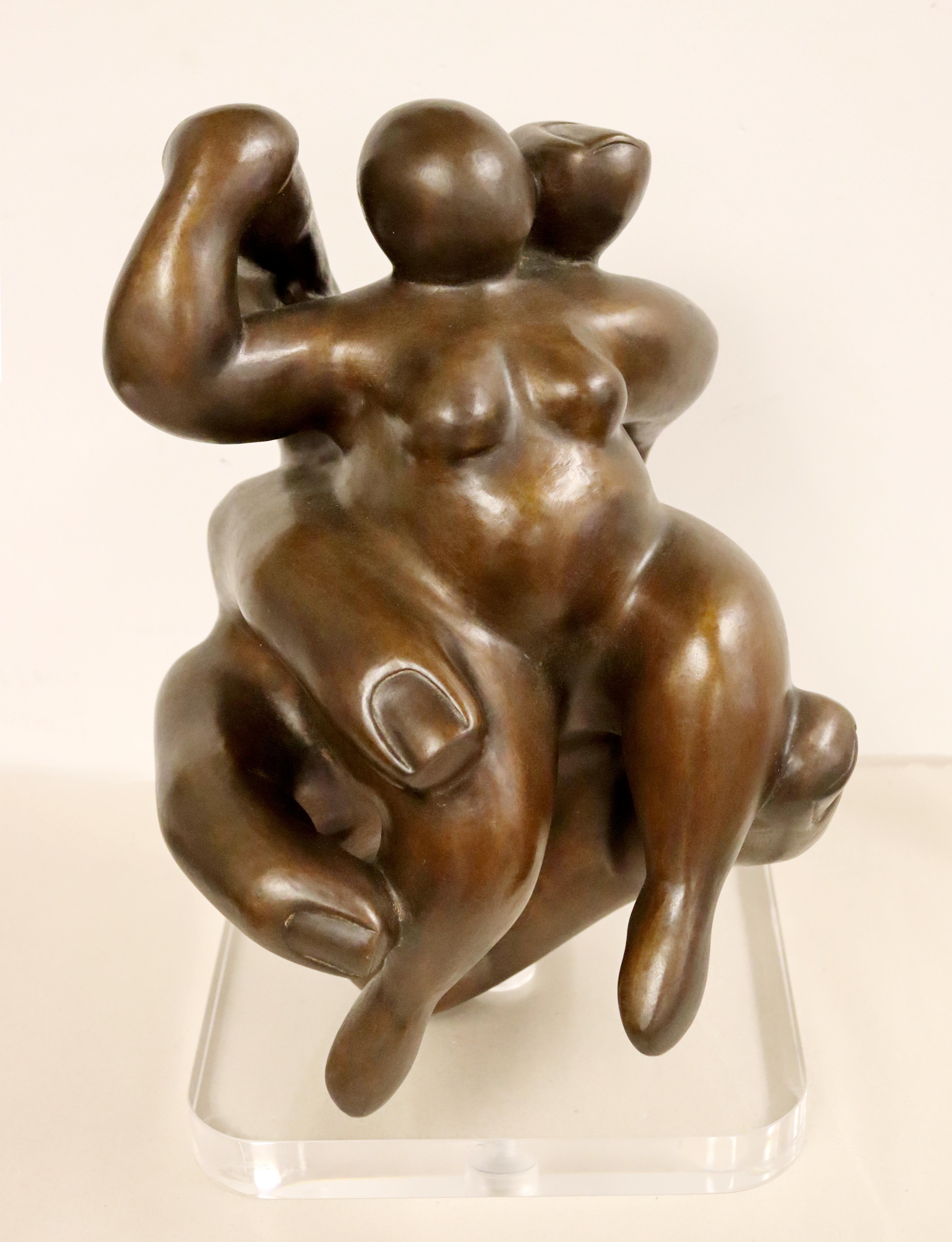 For your consideration is an astonishing, bronze table sculpture, of a woman sitting in a hand, 