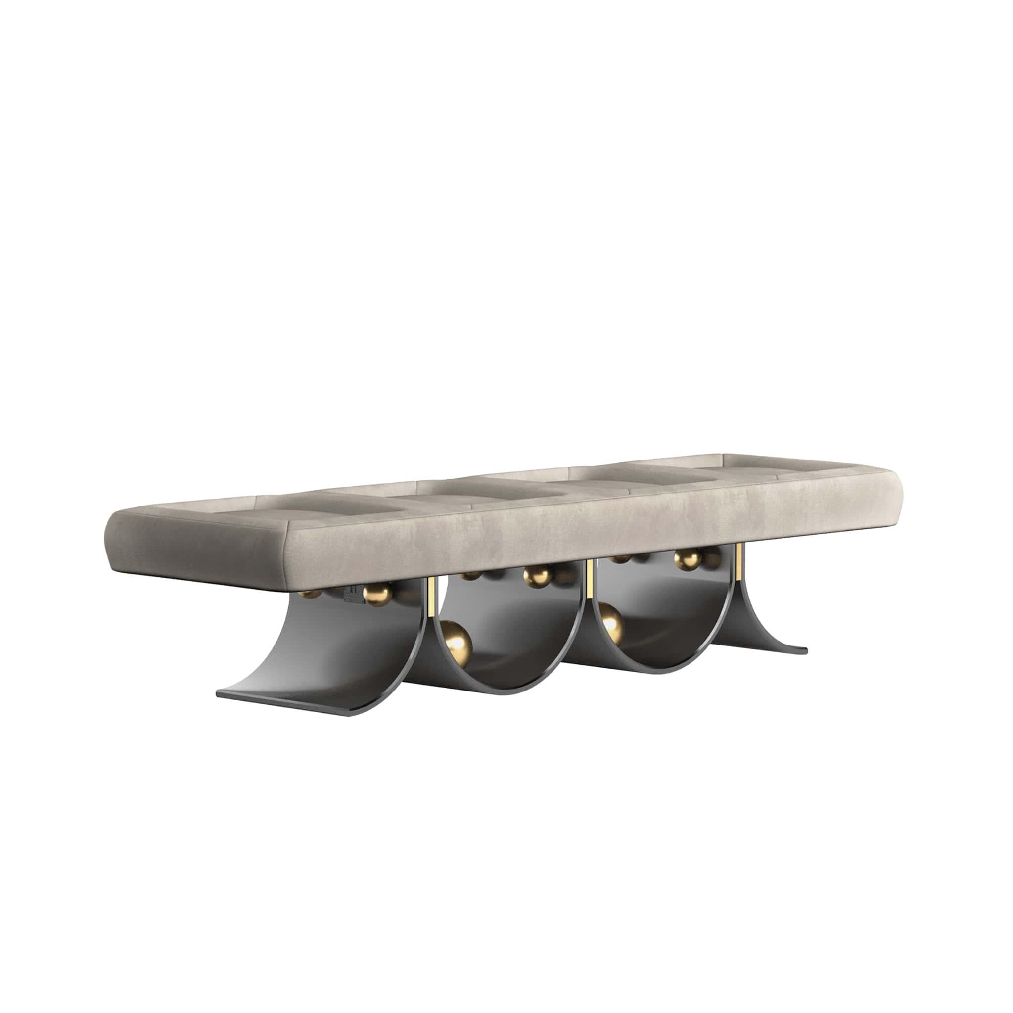 Arcana Bench is an Art Deco-inspired bench that will steal the show in any modern living room project. A luxury bench upholstered in leather with a playful design base with polished brass details.

Materials: Upholstered in Suede; Base in Black