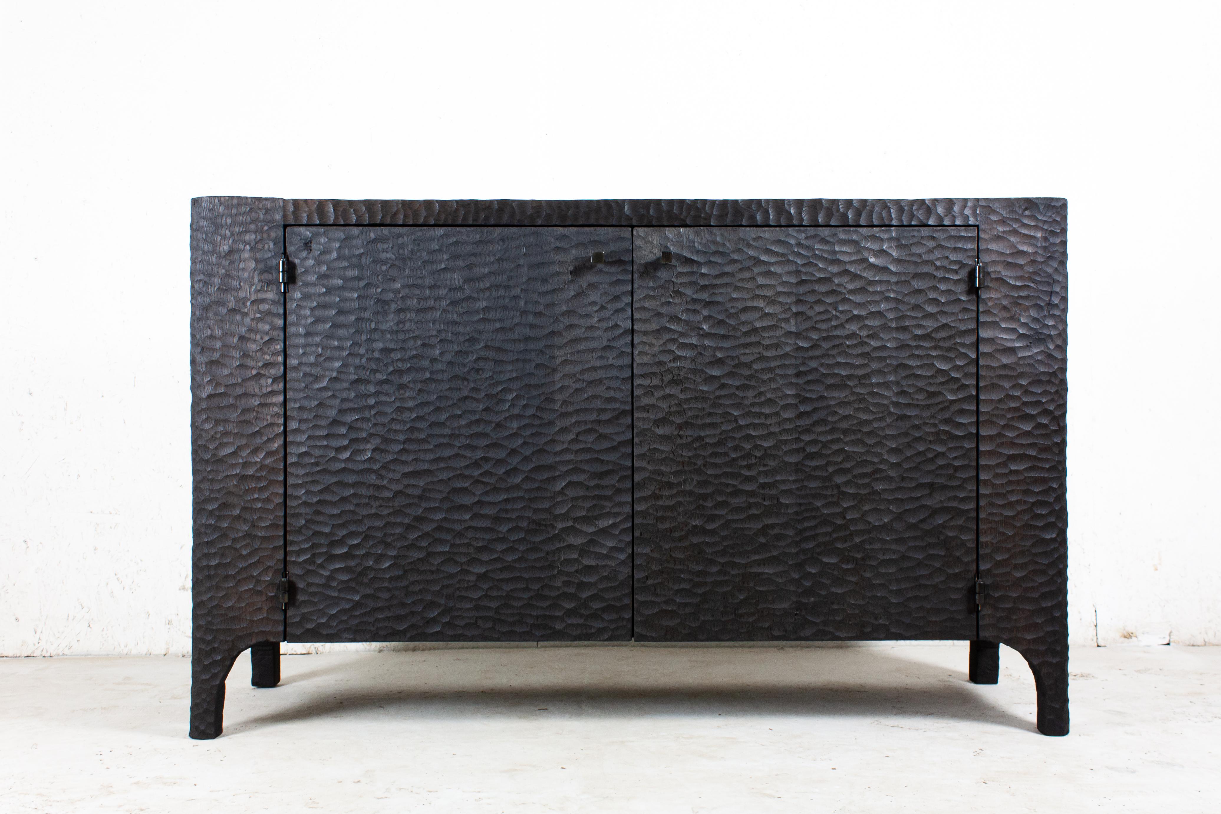 Dresser / Cabinet
Sculpted wood (solid oak)
Finish: hammered, dark

SÓHA design studio conceives and produces furniture design and decorative objects in solid oak in an authentic style. Inspiration to create all these items comes from the Russian