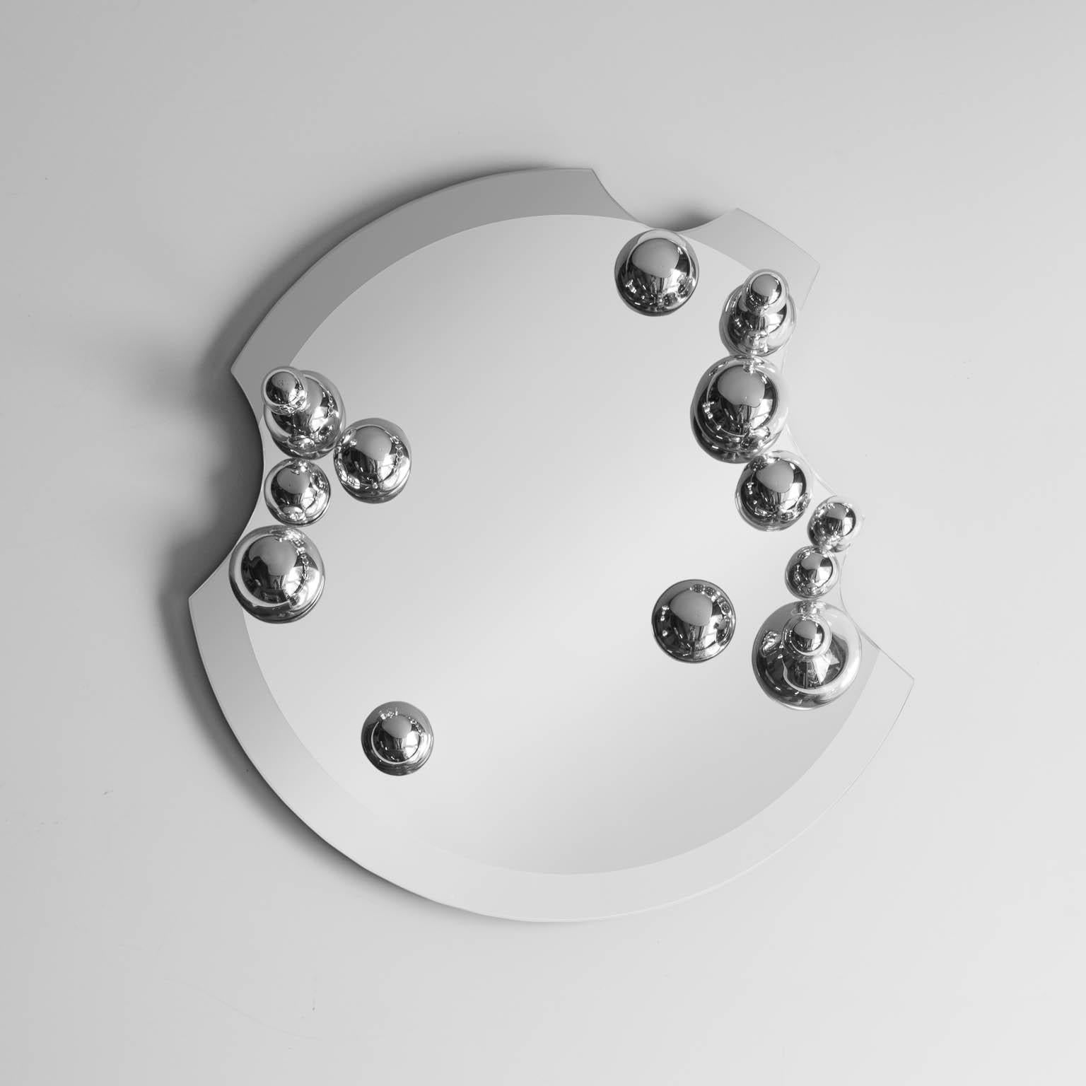 Contemporary Silvered Glass Mirror
By Simone Crestani
Unique Piece – Functional

This exceptional mirror by Simone Crestani explores the subtle dichotomy between object and reflection. Hand-cut with meticulous care, the surface is adorned with