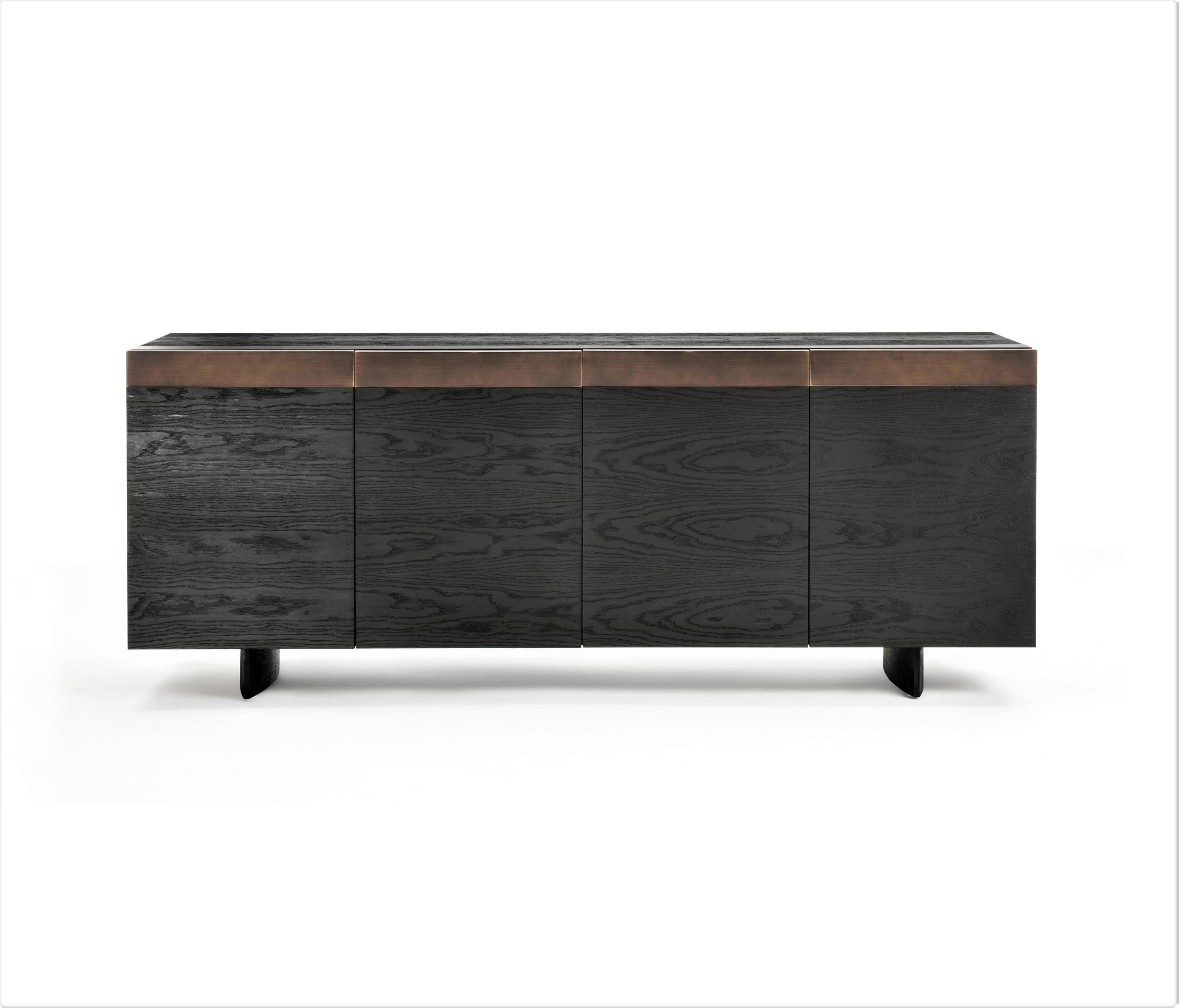 This piece is entirely made in Italy preserving the craftsmanship in the age of technology, with timeless creations which don’t follow short-term trends.
Crafted of solid oakwood pigmented in black, with doors and pull-out shelves inside. With an