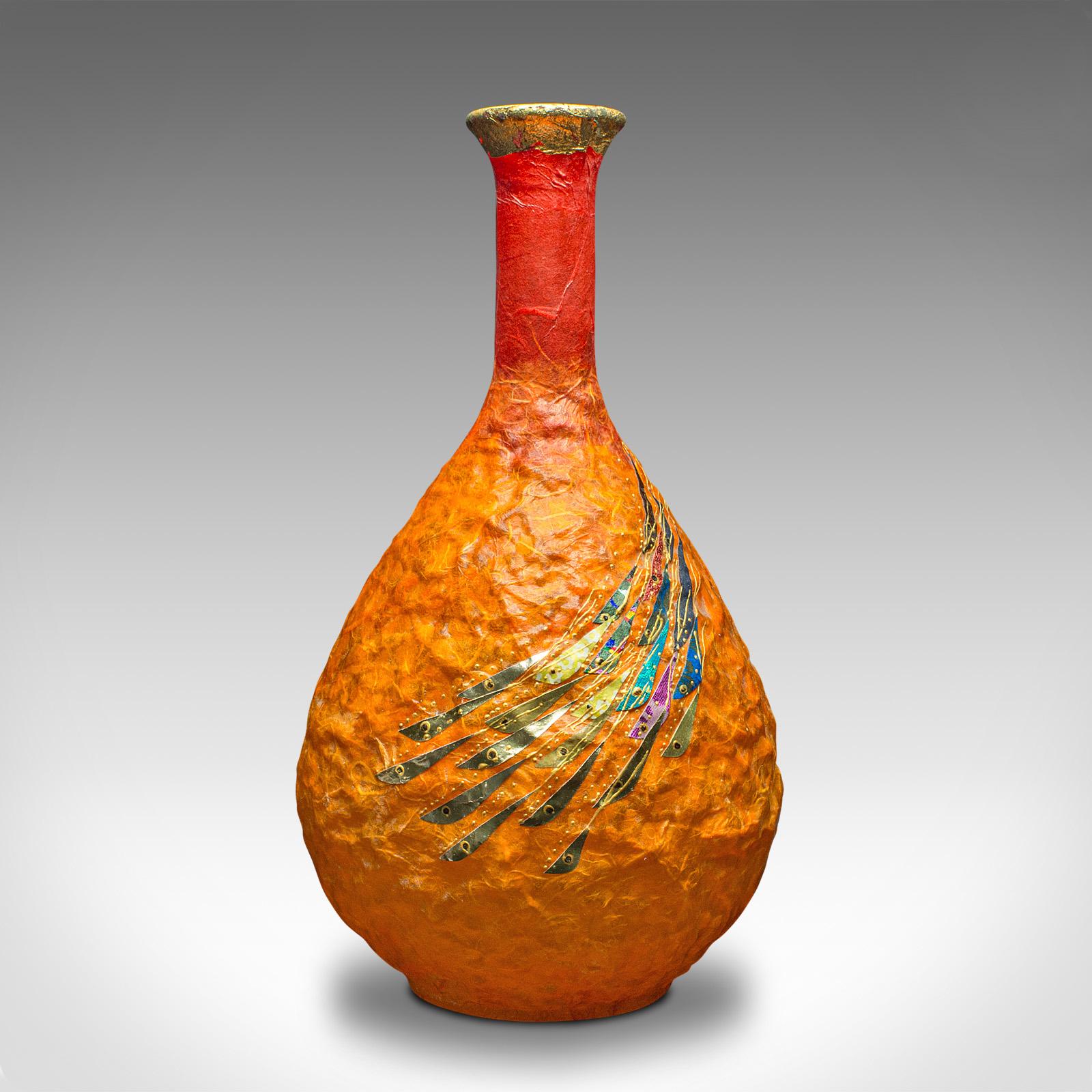 This is a contemporary bulb posy vase. An English, art glass and straw silk decorative urn by Margaret Johnson.

Superb colour with the artist's signature fish shoal motif
Displaying a desirable, contemporary appearance and in good order
Attractive