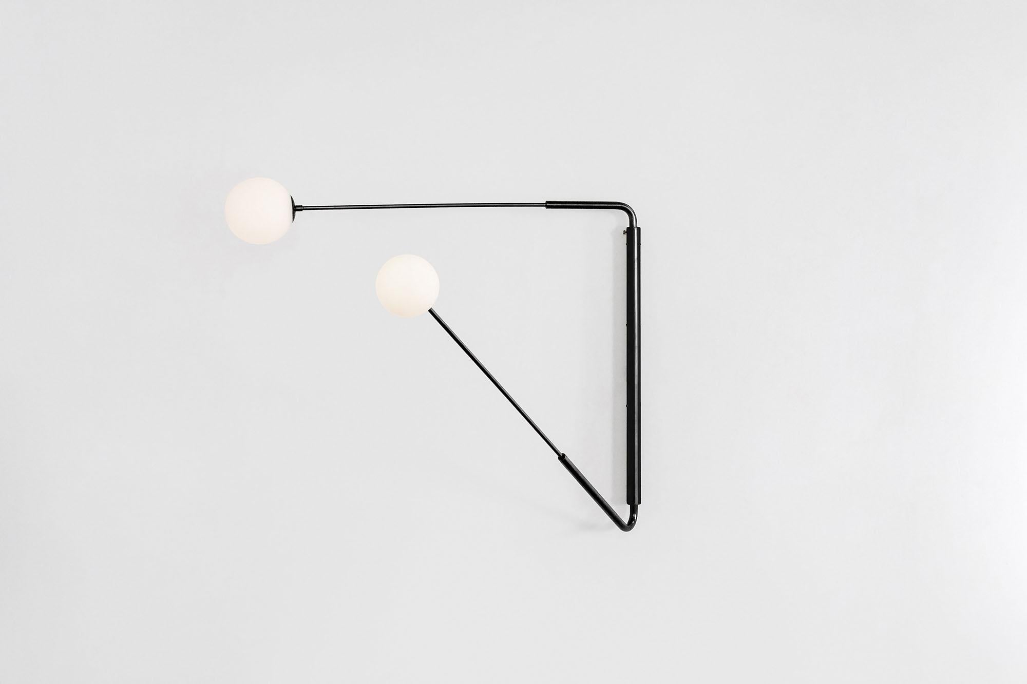Contemporary Burnt Brass Swing Arm Wall Sconce, Flutter One by Paul Matter

The long rotating arms are attached to a vertical, wall-mounted spine that results in a Minimalist yet oversized fixture. Flutter comes in three variations, each with two