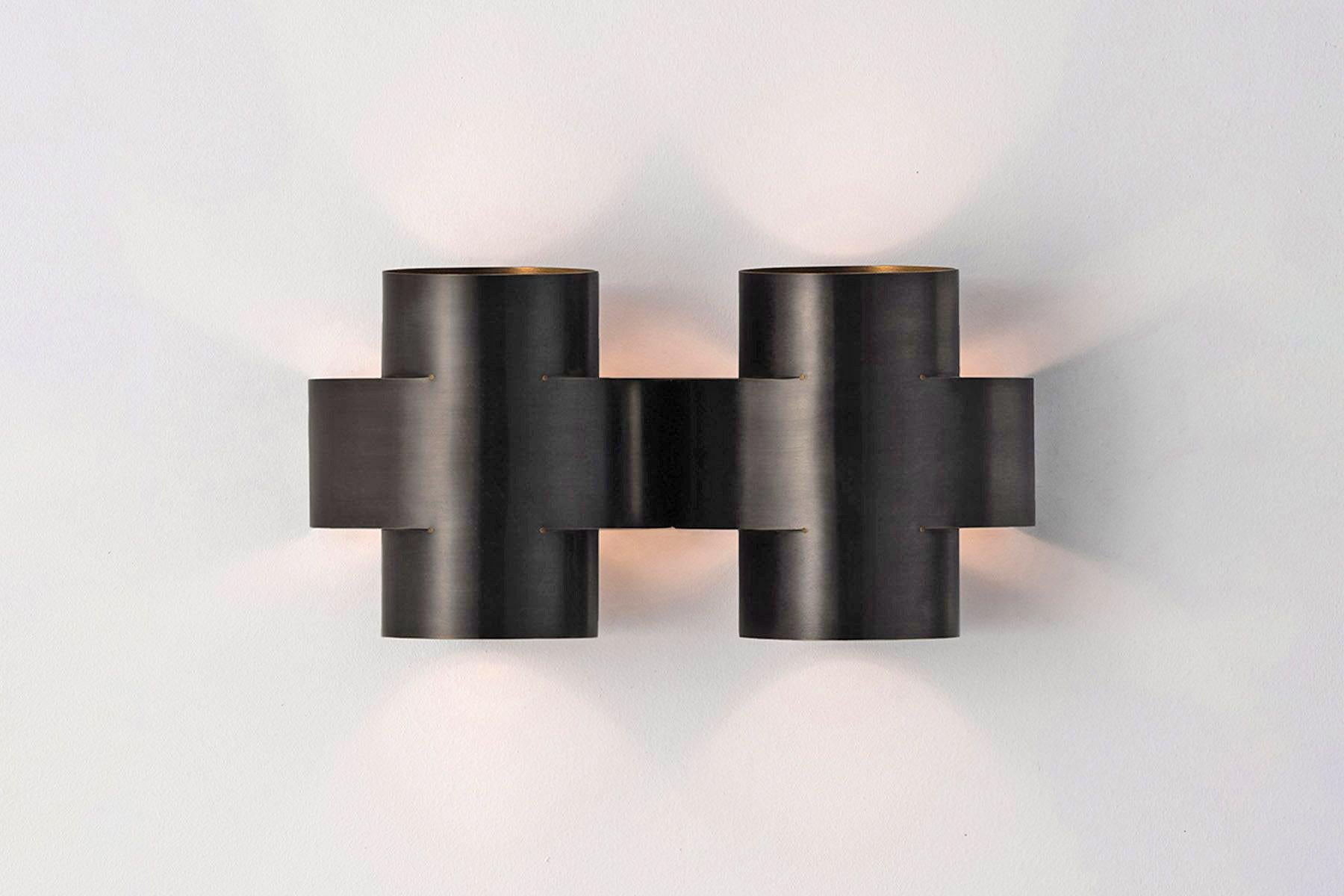 Contemporary Burnt Brass Wall Sconce, Plus Two Large Lamp by Paul Matter

PLUS Series is a new range of appliqués by Paul Matter that feature a simple shape in singular and repetitive arrangements. A 3-Dimensional plus is formed out of a single tube