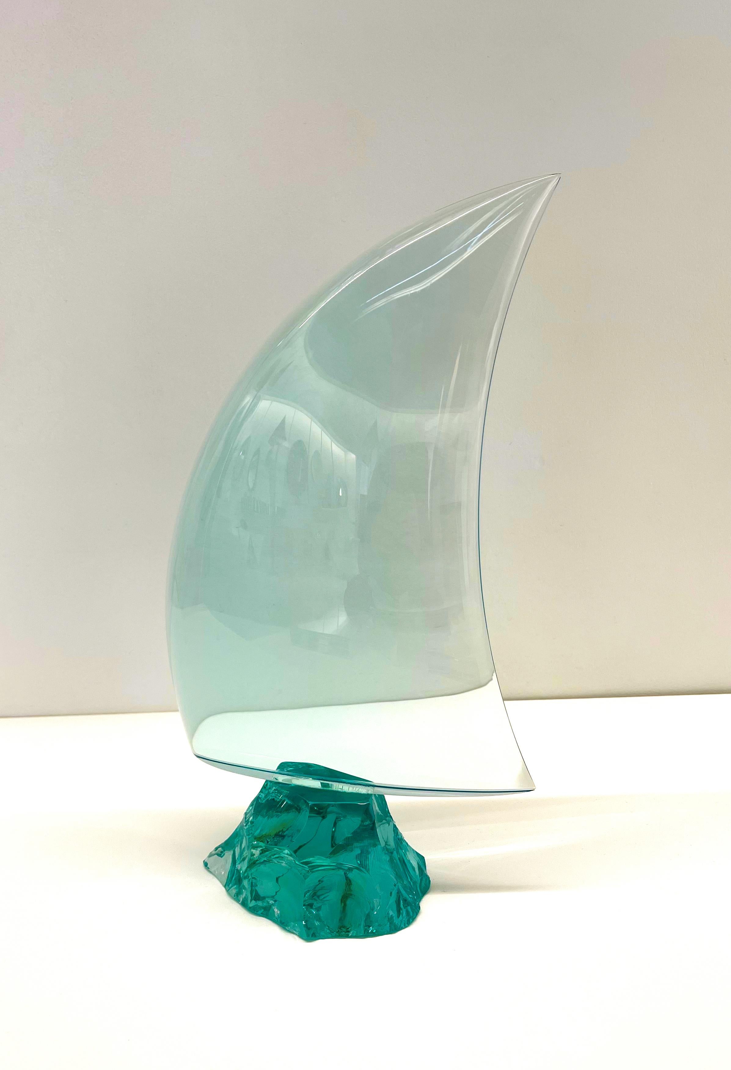 2021 Collection of decorative objects signed by Ghirò Studio (Milan).
The natural crystal has high transparencies with aquamarine reflections, it has been curved and handmade to represent a sail. Every sail is a real artistic sculpture. 
Each