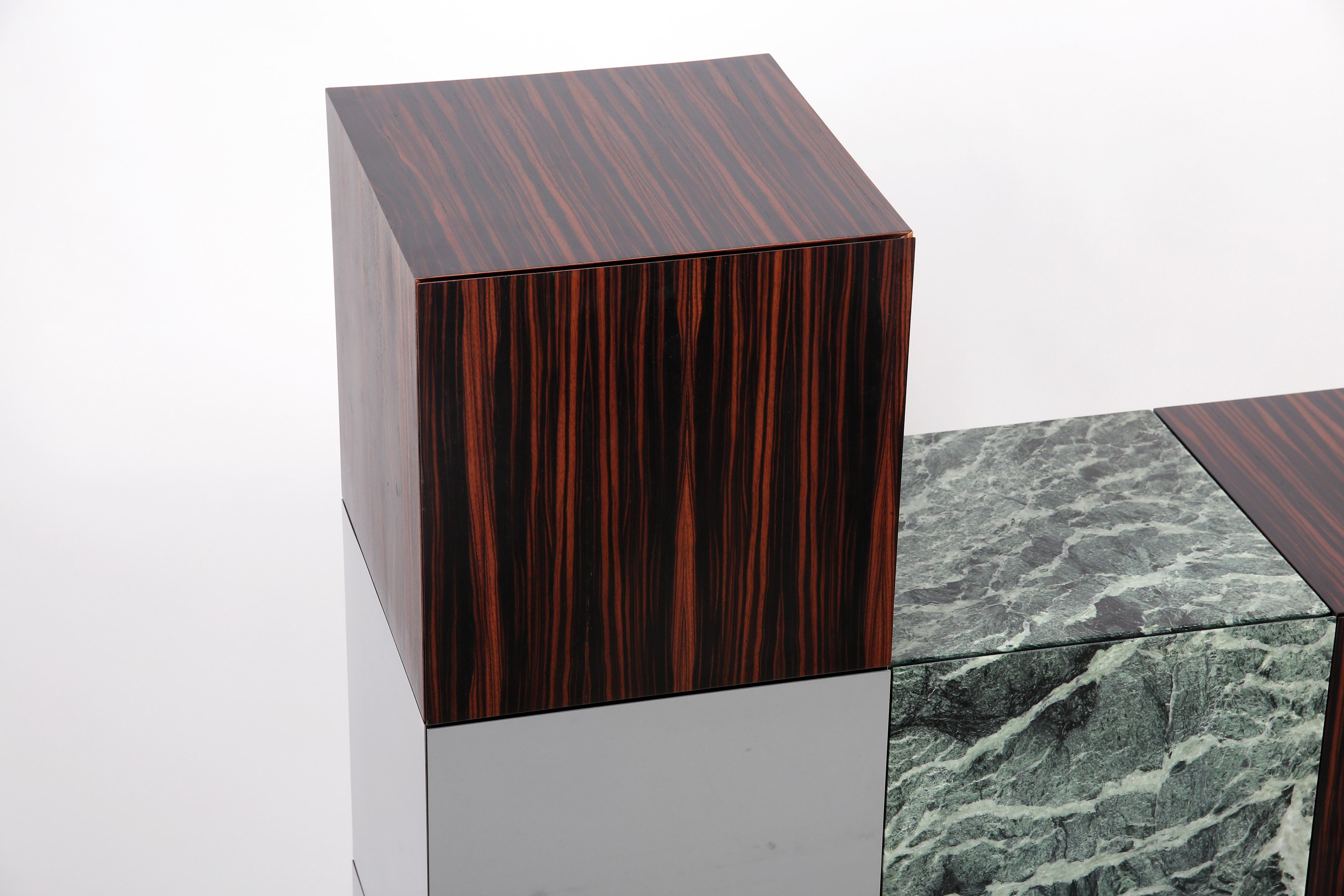 Cabinet CUCU

CUCU cabinet by Railis Design is the perfect addition to any modern living room or dining room. Store away your plates or knickknacks in a stylish way. Made of Ebony veneer, Verde alpi marble and polished stainless steel! Interior