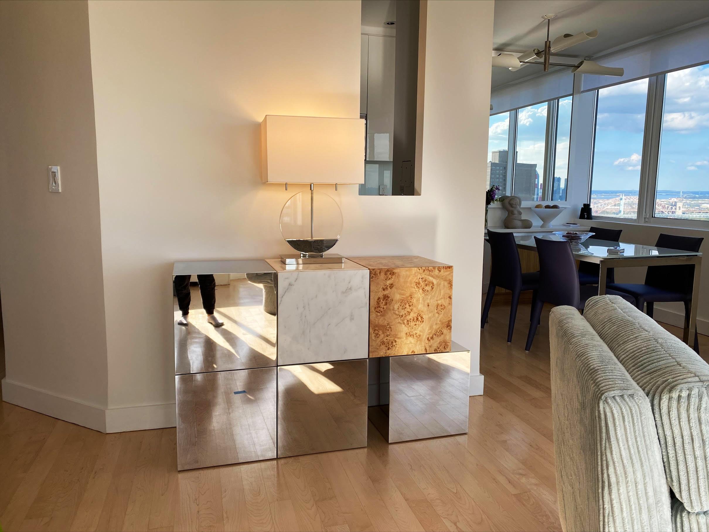 Cabinet CUCU

CUCU cabinet by Railis Design is the perfect addition to any modern living room or dining room. Store away your plates or knickknacks in a stylish way. Made of polar root veneer, white marble and polished stainless steel! Interior