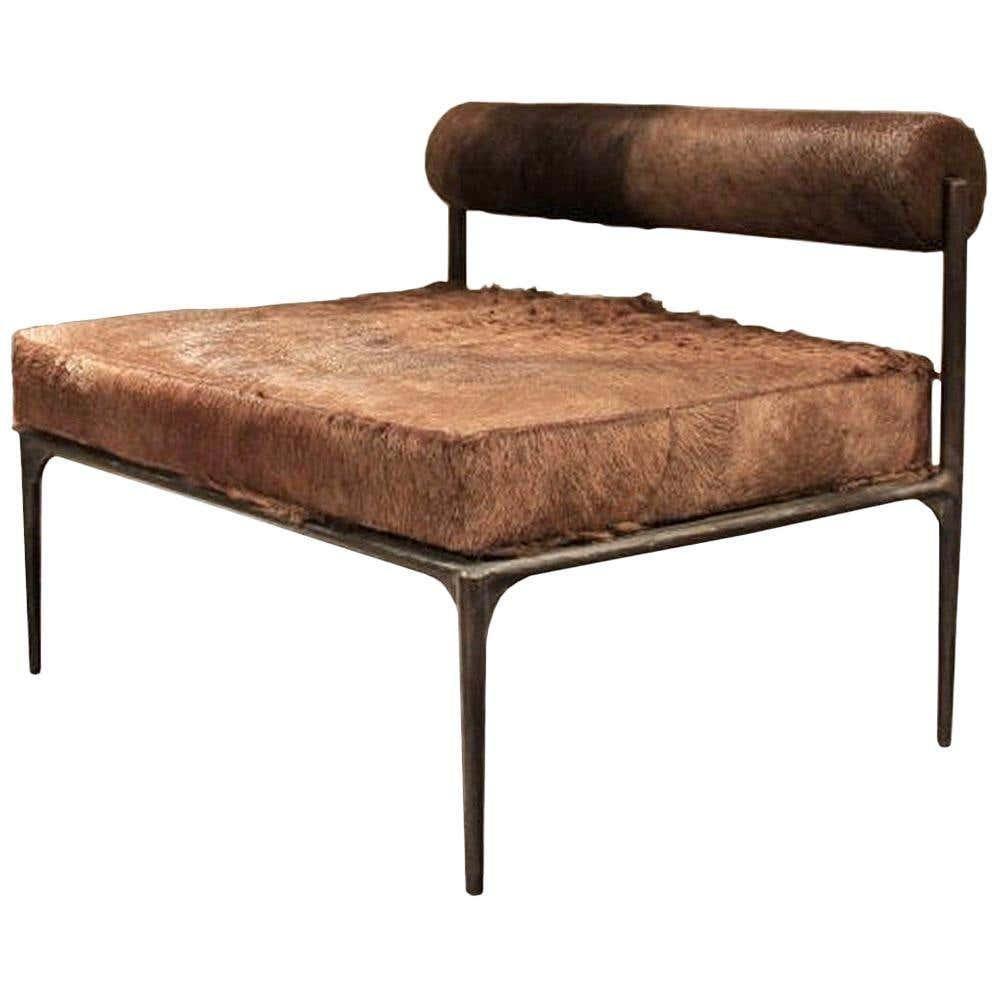 Contemporary camel upholstered bench - Alchemy Bench by Rick Owens
2015
Dimensions: L 100 x W 74 x H 75 cm
Materials: bronze, camel skin
Weight: 55 kg

Rick Owens is a California-born fashion and furniture has developed a unique style that he