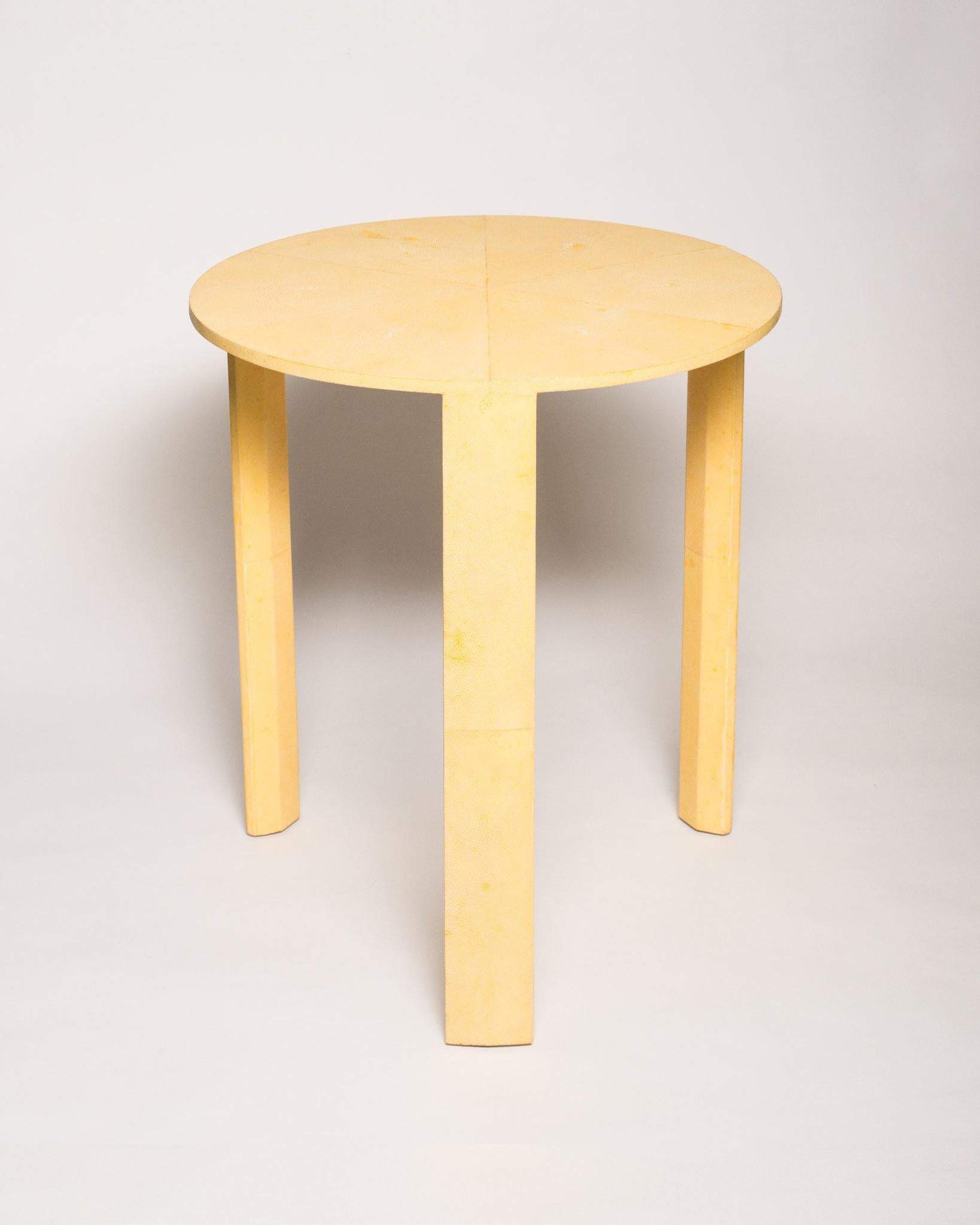 Brighten up your home with this canary yellow authentic Shagreen side table. In a monochromatic world of grey, this table will add that perfect pop of color that you’ve been looking for. This round table is exquisitely crafted with a veneer wood