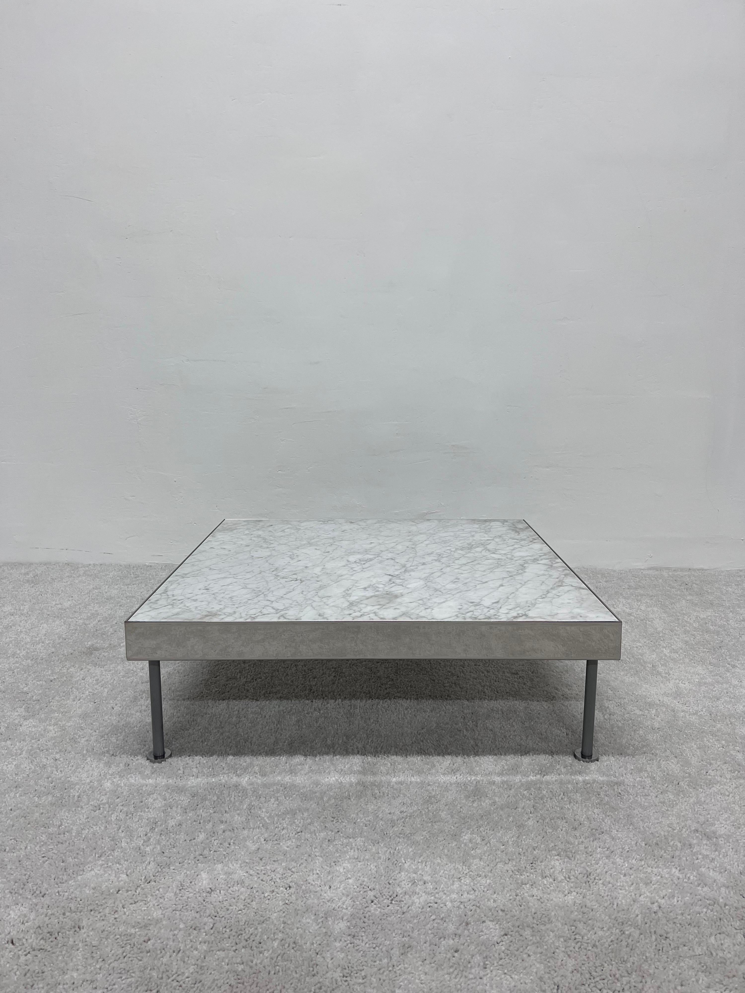 Low coffee or cocktail table with Carrara marble inset top, polished steel banding and gray steel legs. Italy 1980s.