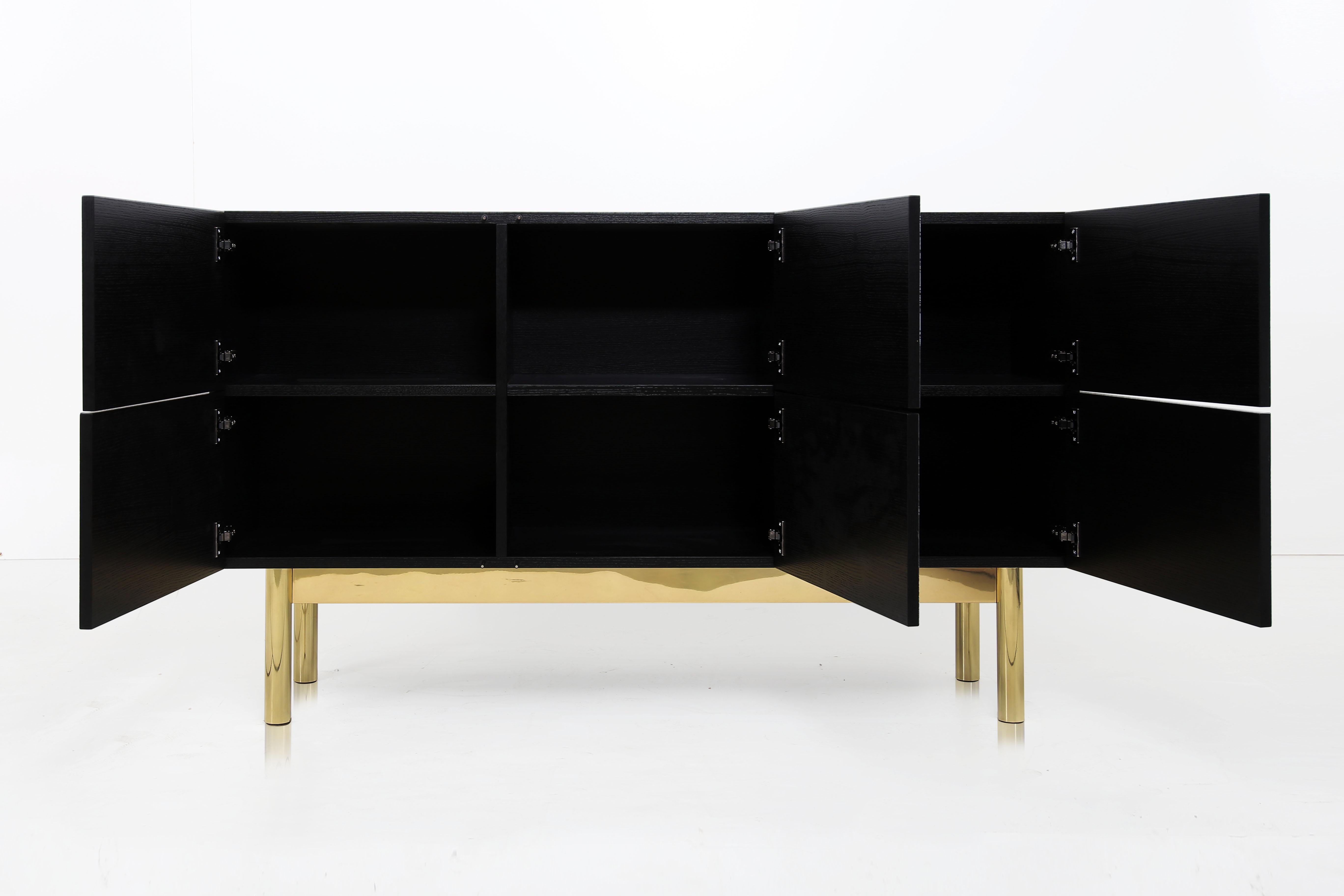 black and brass sideboard