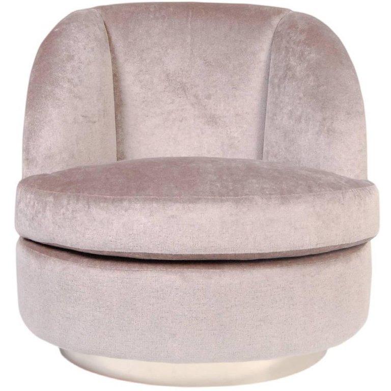 The Macaroon chair is a retro inspired comfortable cocktail chair mounted on a rotating circular ribbon pale brass base. The soft feminine curves ensure a fun yet timeless piece suitable for any room setting.