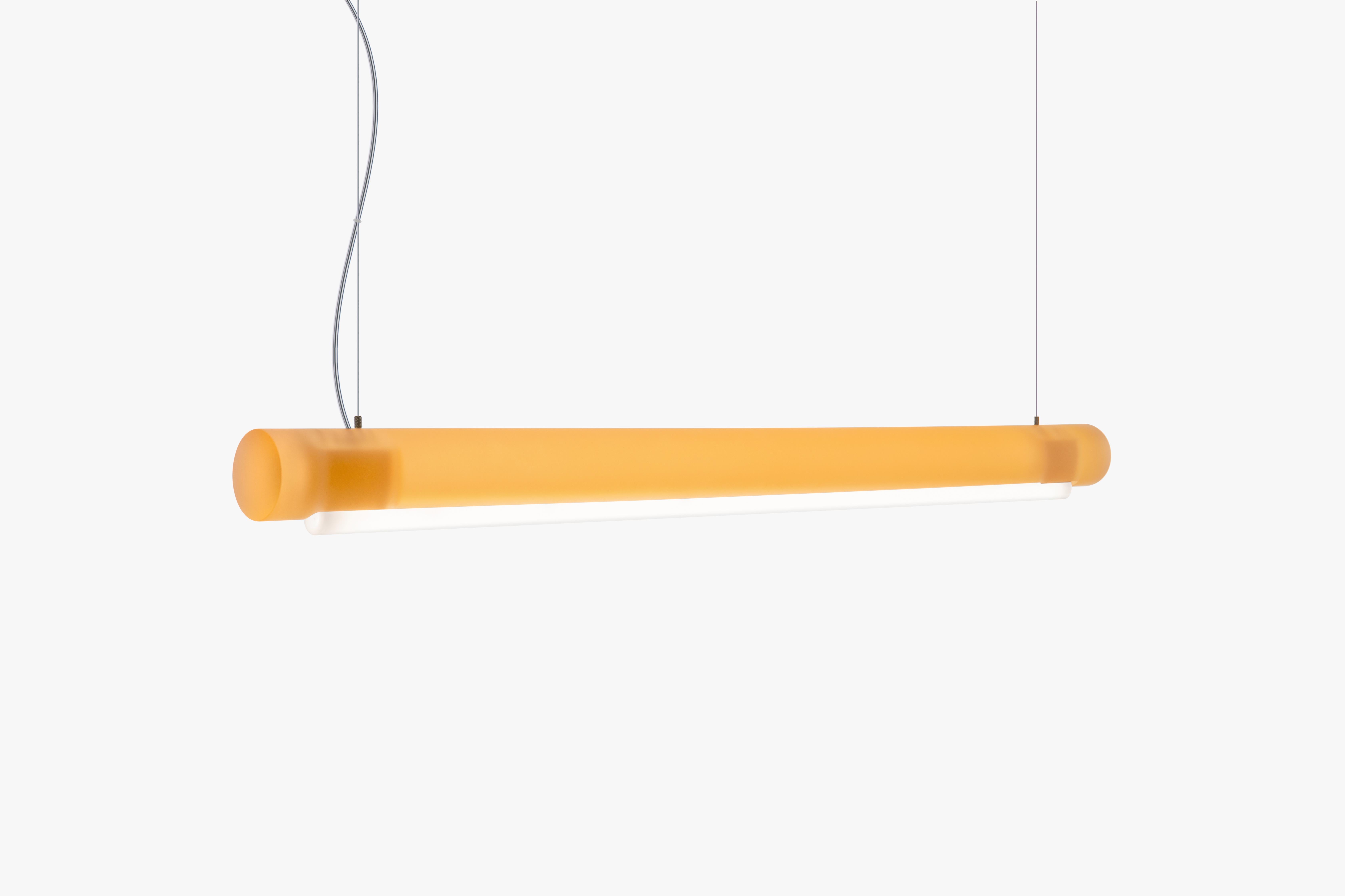 Harnessing Marcelis’ expertise in colour, the suspended cylinder bar of the Aura Light can stand alone or work as part of a grouping. Over a metre in length, the design is made from a bio-epoxy resin, created using by-products from farming. A
