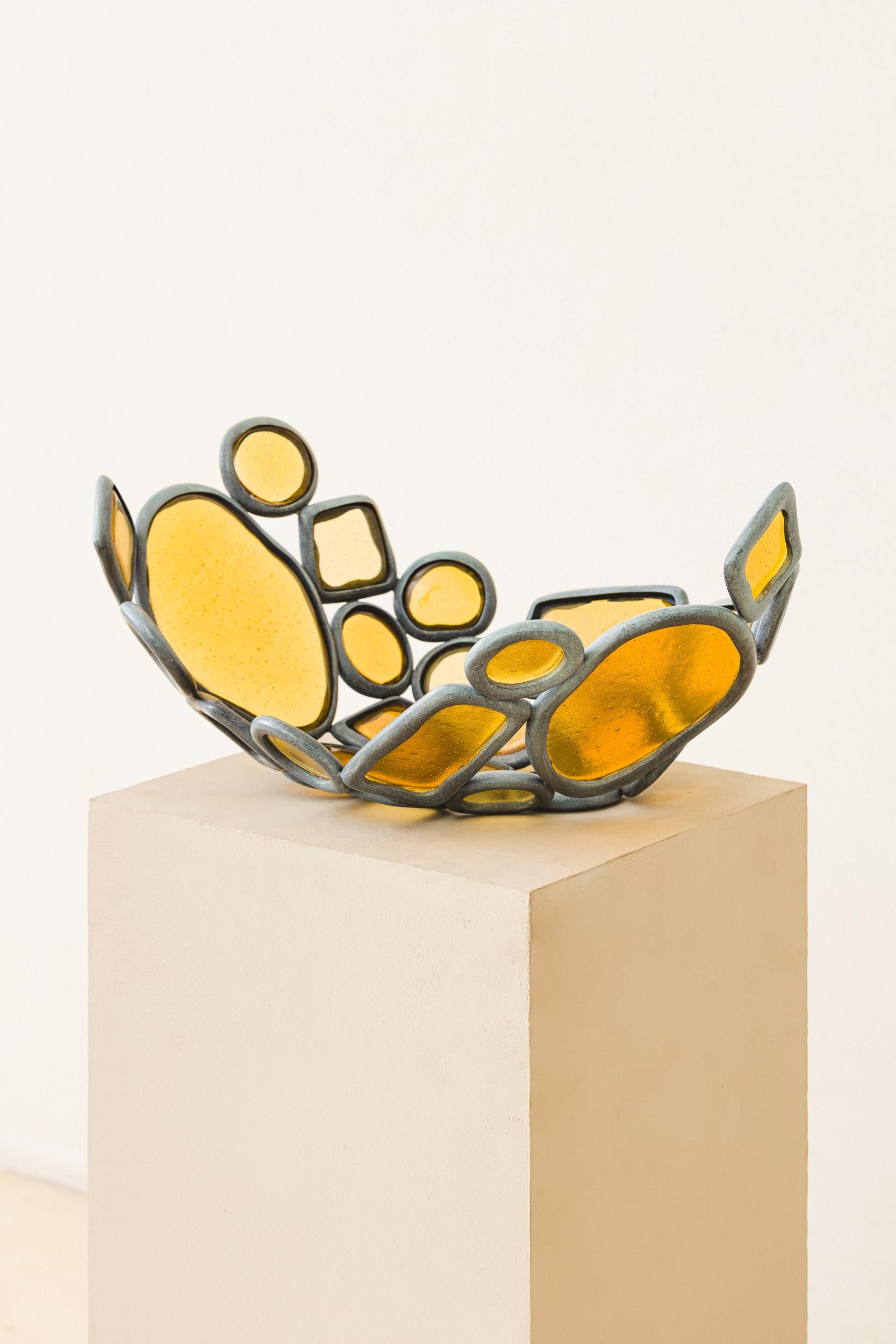 The Material Distortion Collection investigates how repeated geometries can be reorganized to produce distinct typologies. Using six modular rings, Recchia composes objects through rotation, stacking, and alignment. Combined with cast bronze or