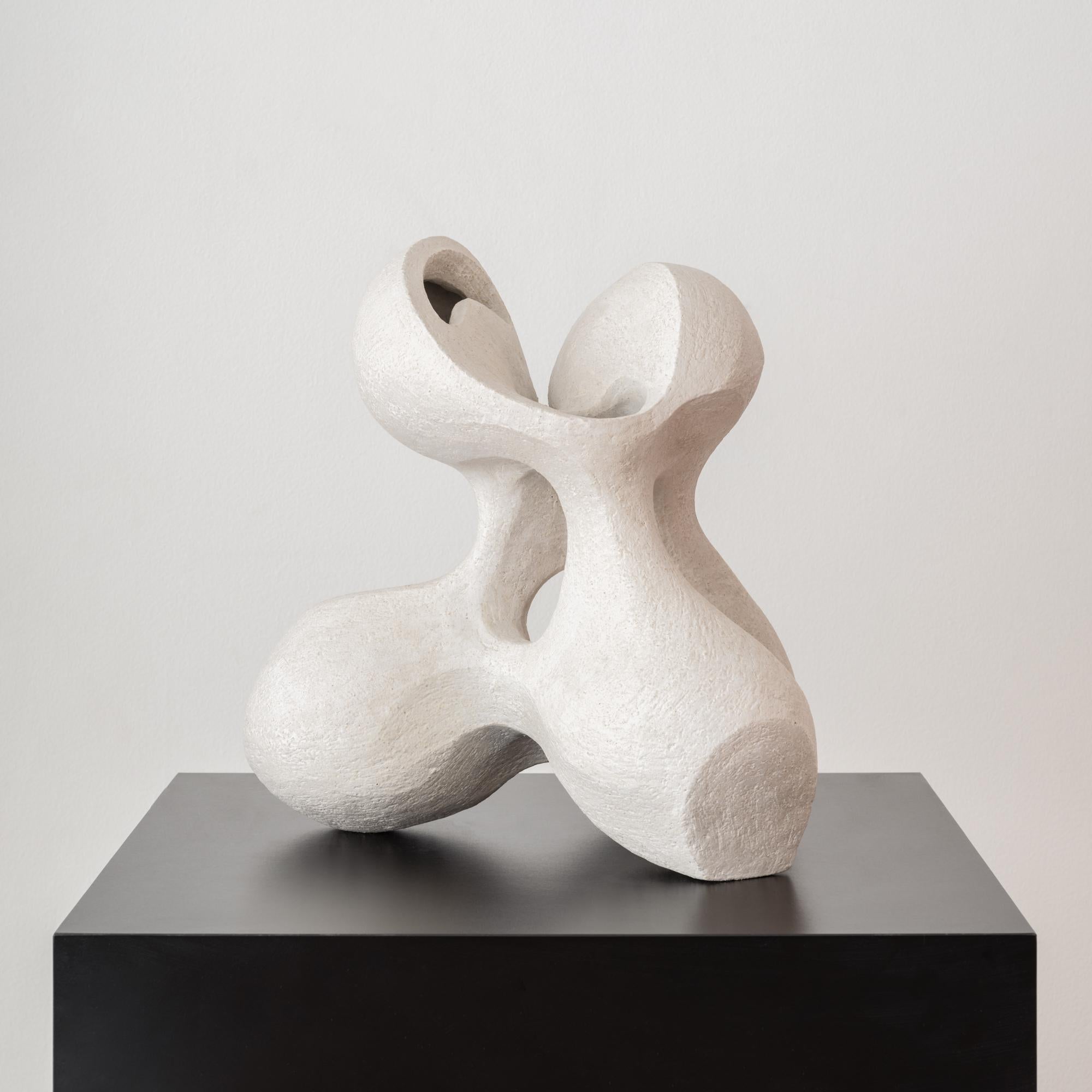 Entitled 'Matriarch', this original ceramic sculpture by Simone Bodmer-Turner weaves a mesmerizing narrative, where each curve and crevice leads to unexpected connections and perspectives. As your eyes explore the contours of 'Matriarch',  a series