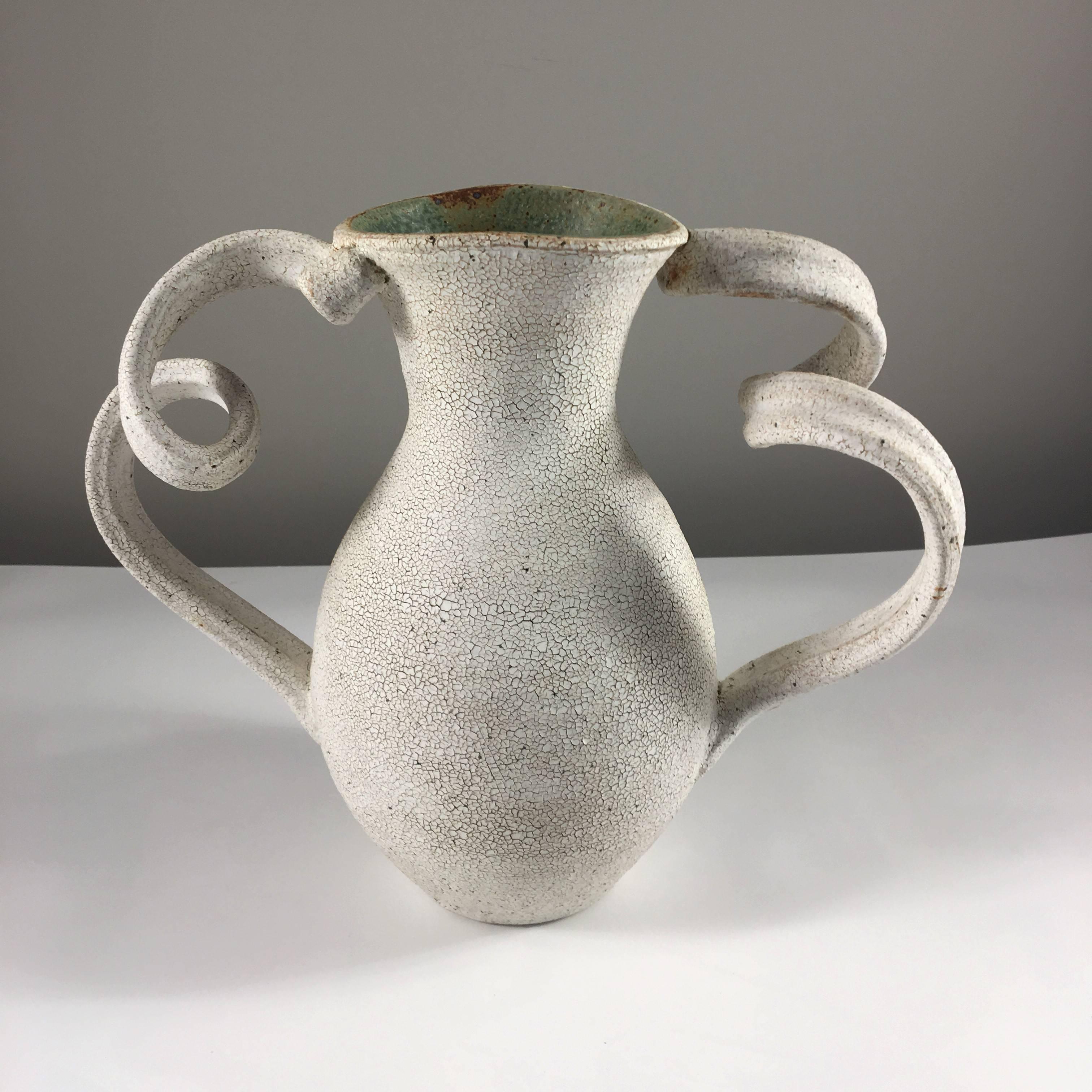 Contemporary ceramic artist Yumiko Kuga's glazed stoneware amphora vase no. 151 is part of her Crackle Series. All of the pieces in this series are hand-built and 100% handmade so they are one-of-a-kind and thus vary slightly from one another. All