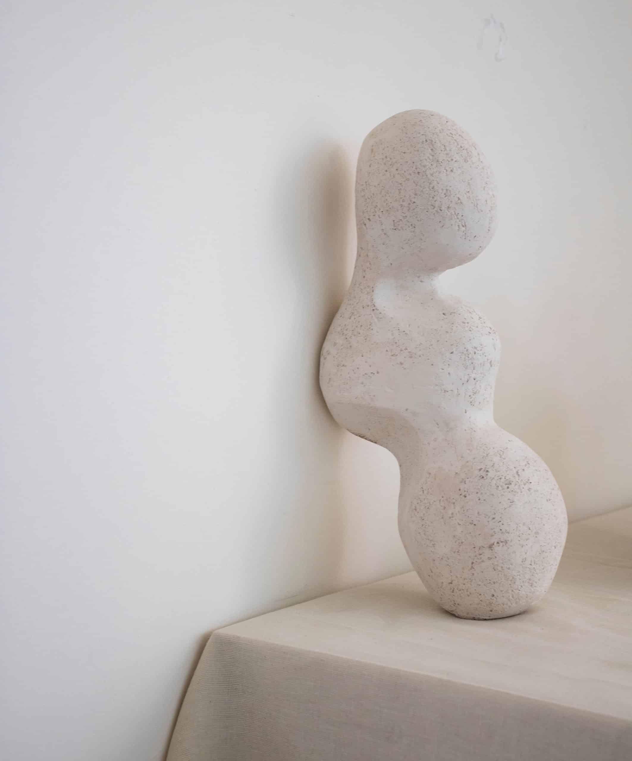 Buddy is a handmade ceramic sculpture, fired in bisqueware, creating a distinctive texture and depth that exudes the warmth and intimacy of a close friend. The sculpture can be presented in two different placements. Its abstract and organic form