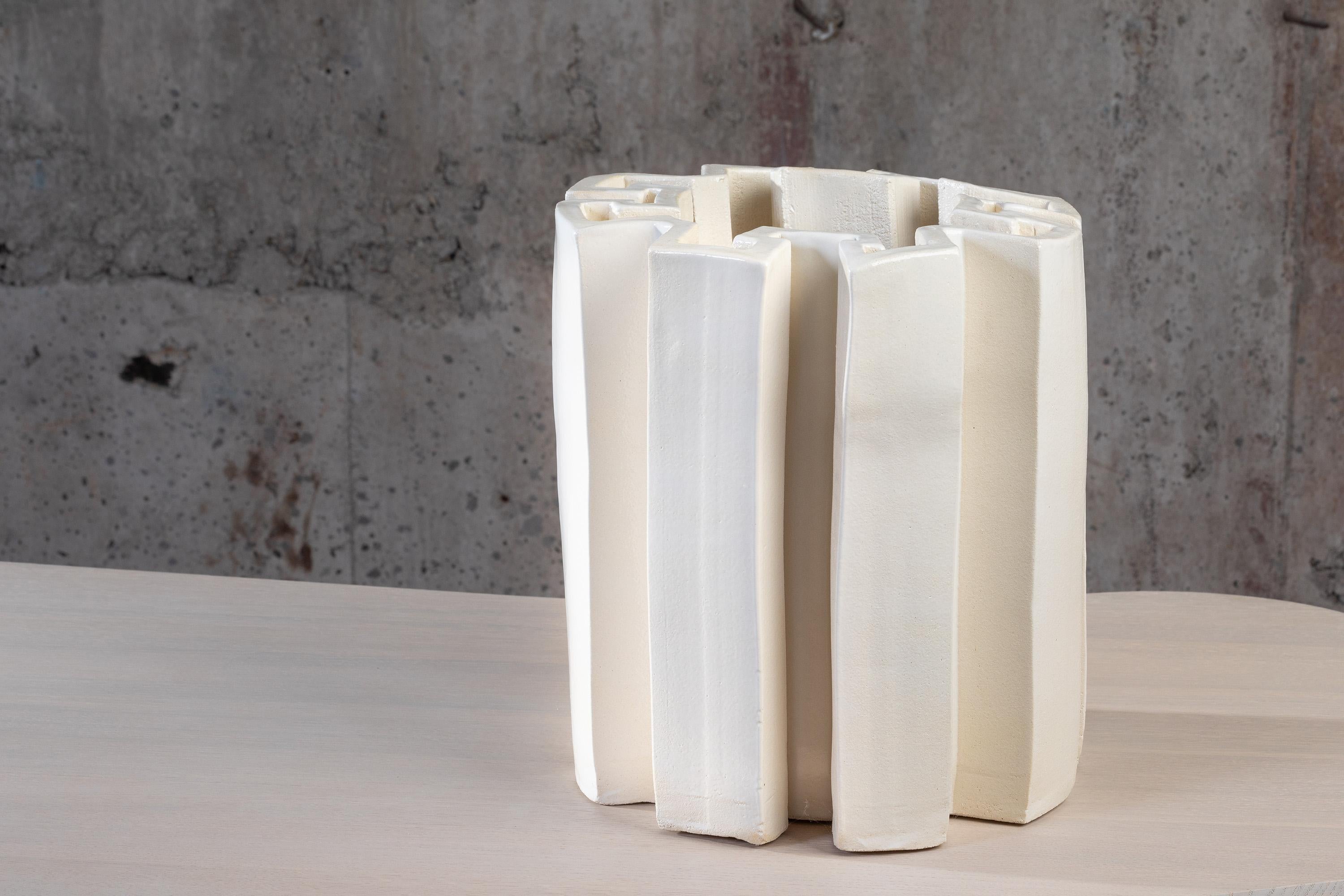 Contemporary ceramic large crown vase by Floris Wubben

With the Pressed project Studio Floris Wubben wants to explore materials’ characteristics and their behavior when being molded by a self-developed extrusion machine. This project has the