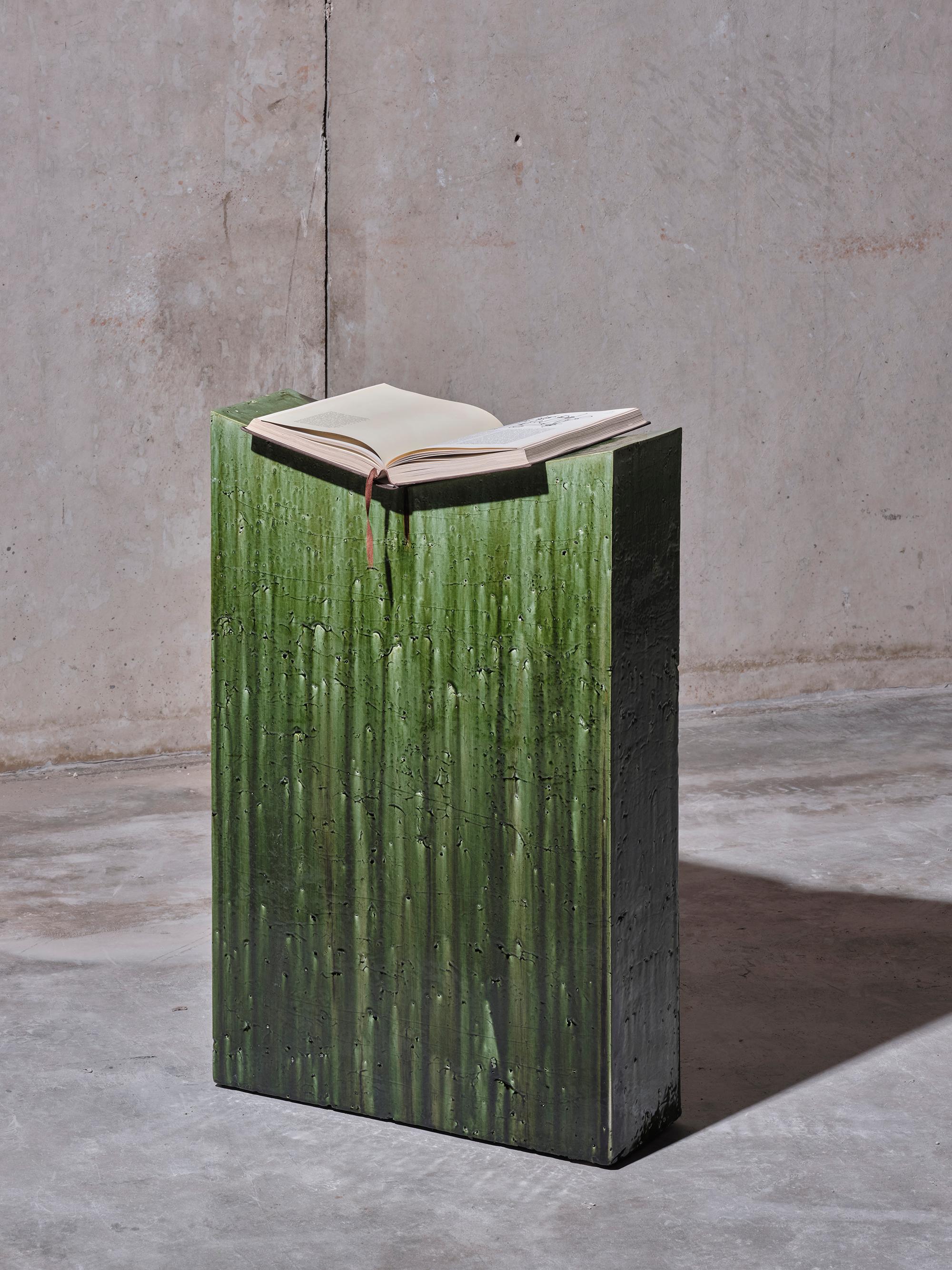 Handmade stoneware lectern manufactured at the workshop of Apparatu in Barcelona. It serves as a standing desk or pedestal. Different clay bodys are mixed with natural fibers like corn, straw, or heather straw. The pieces are casted by hand,