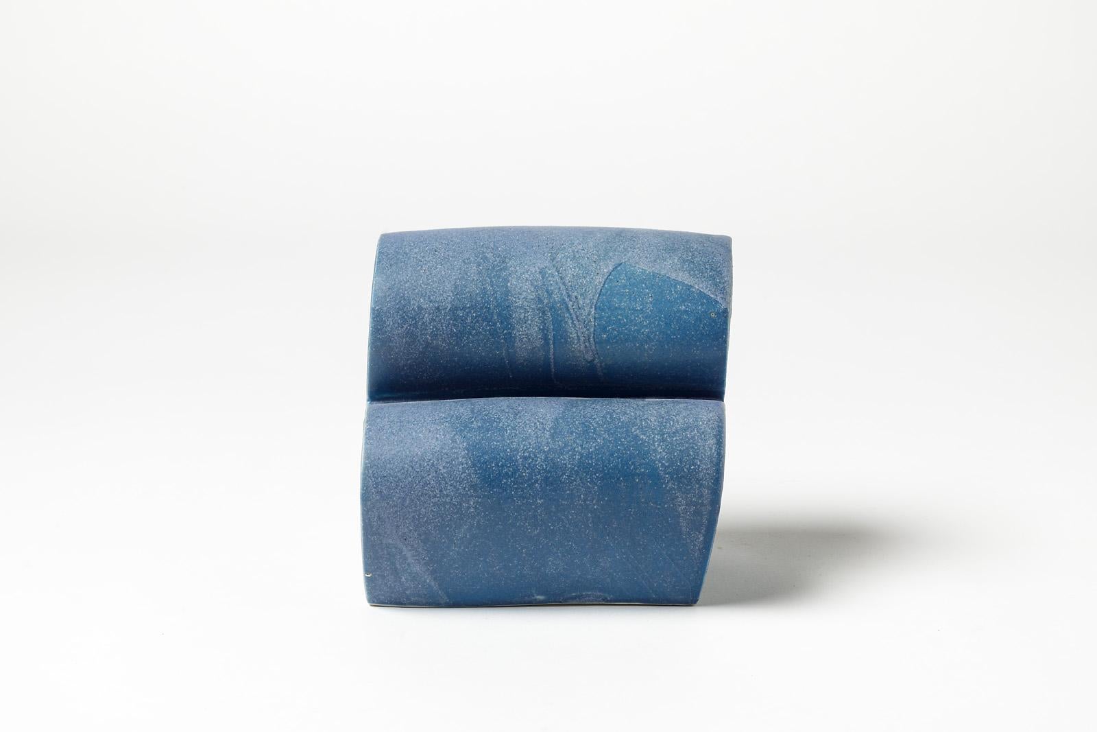 Julia Huteau (Born in 1982).

Contemporary ceramic by the French artist.

Abstract blue ceramic form with beautiful ceramic glaze effects.

Signed under the base.

Dimensions: 14 x 14 x 12 cm.