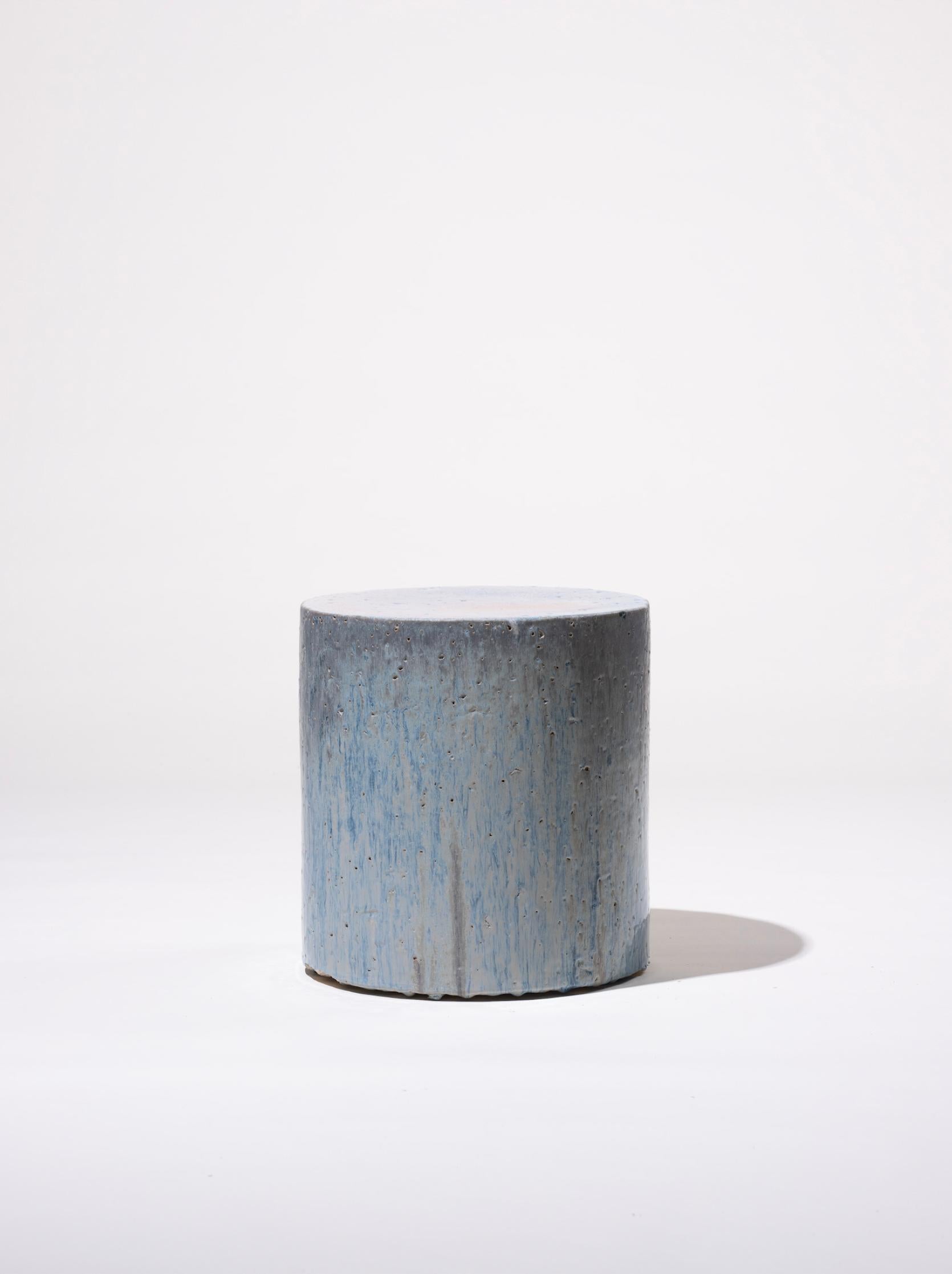 Handmade stoneware side table manufactured at the workshop of Apparatu in Barcelona. Different clay bodys are mixed with natural fibers like corn, straw, or heather straw. The pieces are casted by hand, creating a thick and strong clay structure.