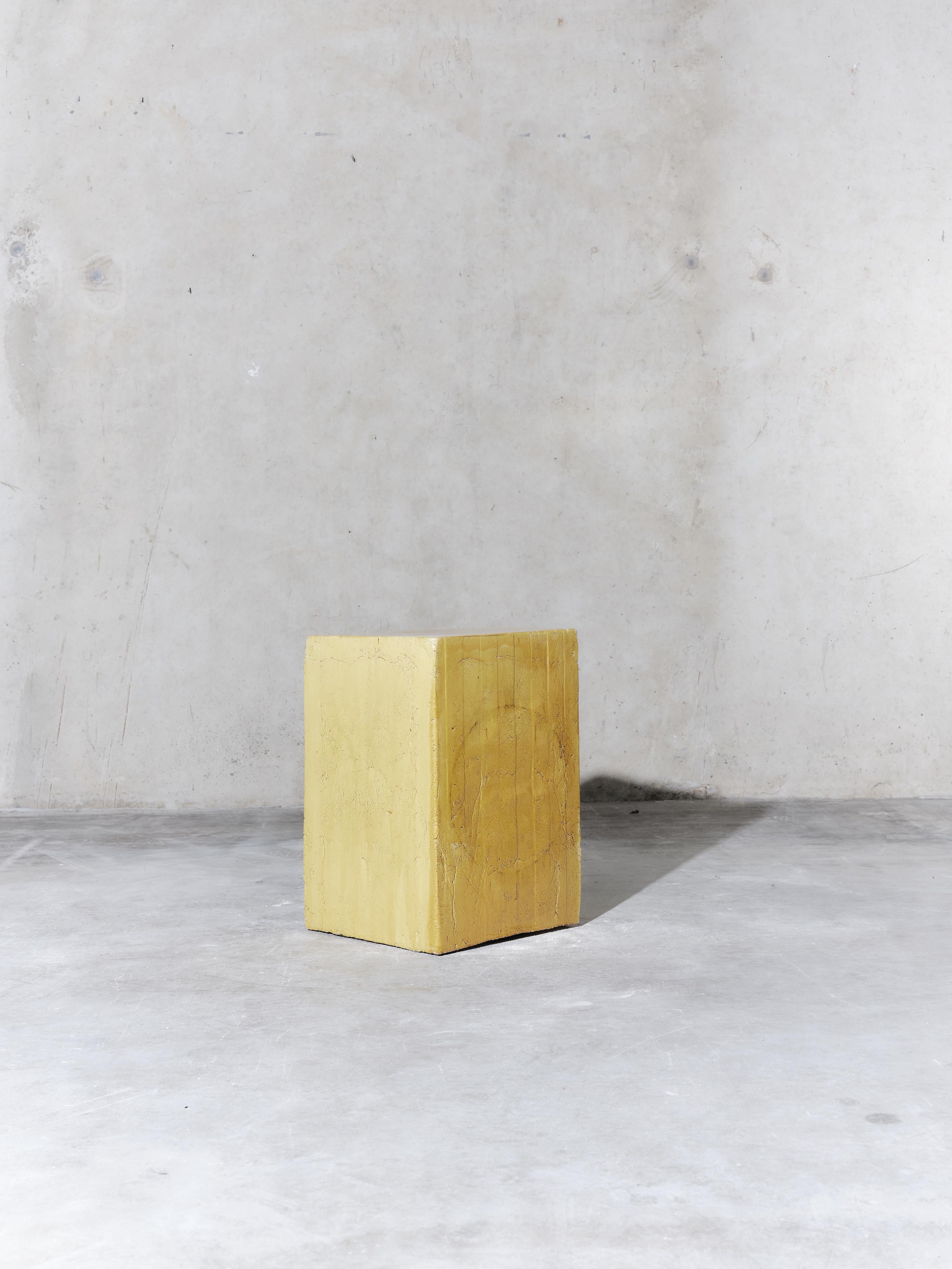 Handmade earthenware side table / column / stool manufactured at the workshop of Apparatu in Barcelona. Different clay bodys are mixed with natural fibers like corn, straw, or heather straw. The pieces are casted by hand, creating a thick and strong