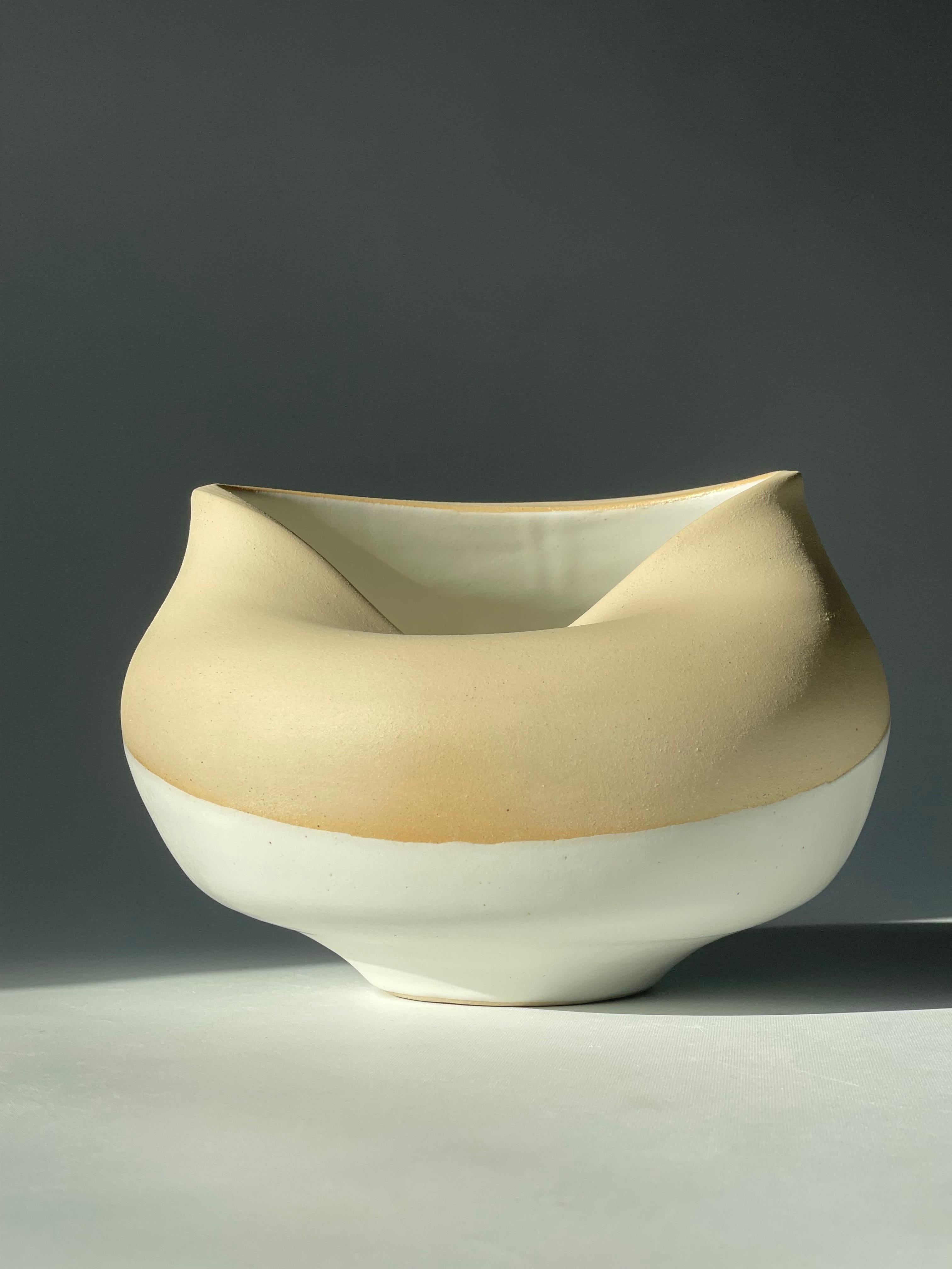 No 48.  Contemporary handmade ceramic natural unglazed two-tone vase with a feature indentation on the rim. Designed and handmade by Brazilian ceramicist Flavio Diogo of FD21 Clay.

Dimensions: Width: 22cm Depth: 19cm Height: 14.5cm Weight: 1.850kg