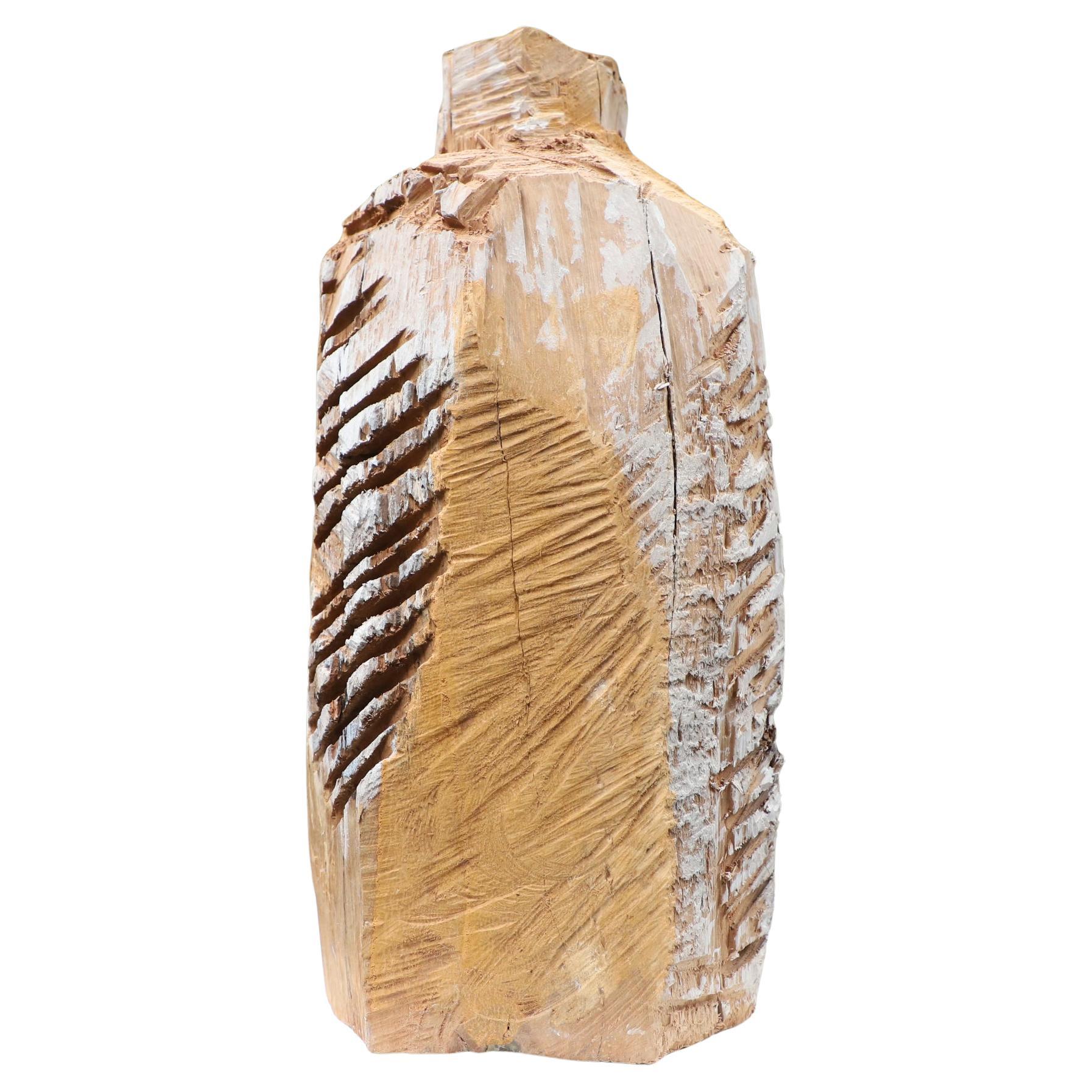 Estas esculturas de madera han sido talladas con motosierra por David Melrose y están hechas con un tronco macizo de nogal negro. 
Los 