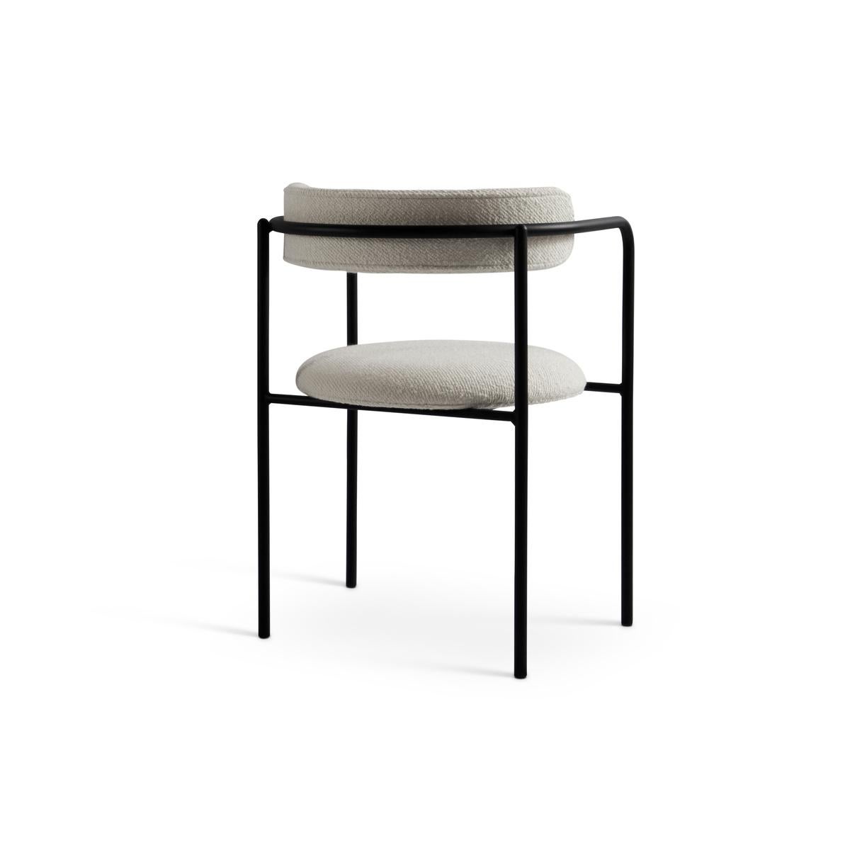 FF 4-Legs, chair 
Design: Friends & Founders

Upholstery available in a wide range of fabrics and leathers
Model shown (fabric): Dedar, A Joy, 001, black frame

Legs:
4 legs or cantilever
Black steel or chrome

Back:
Rounded or cubic

Price may vary