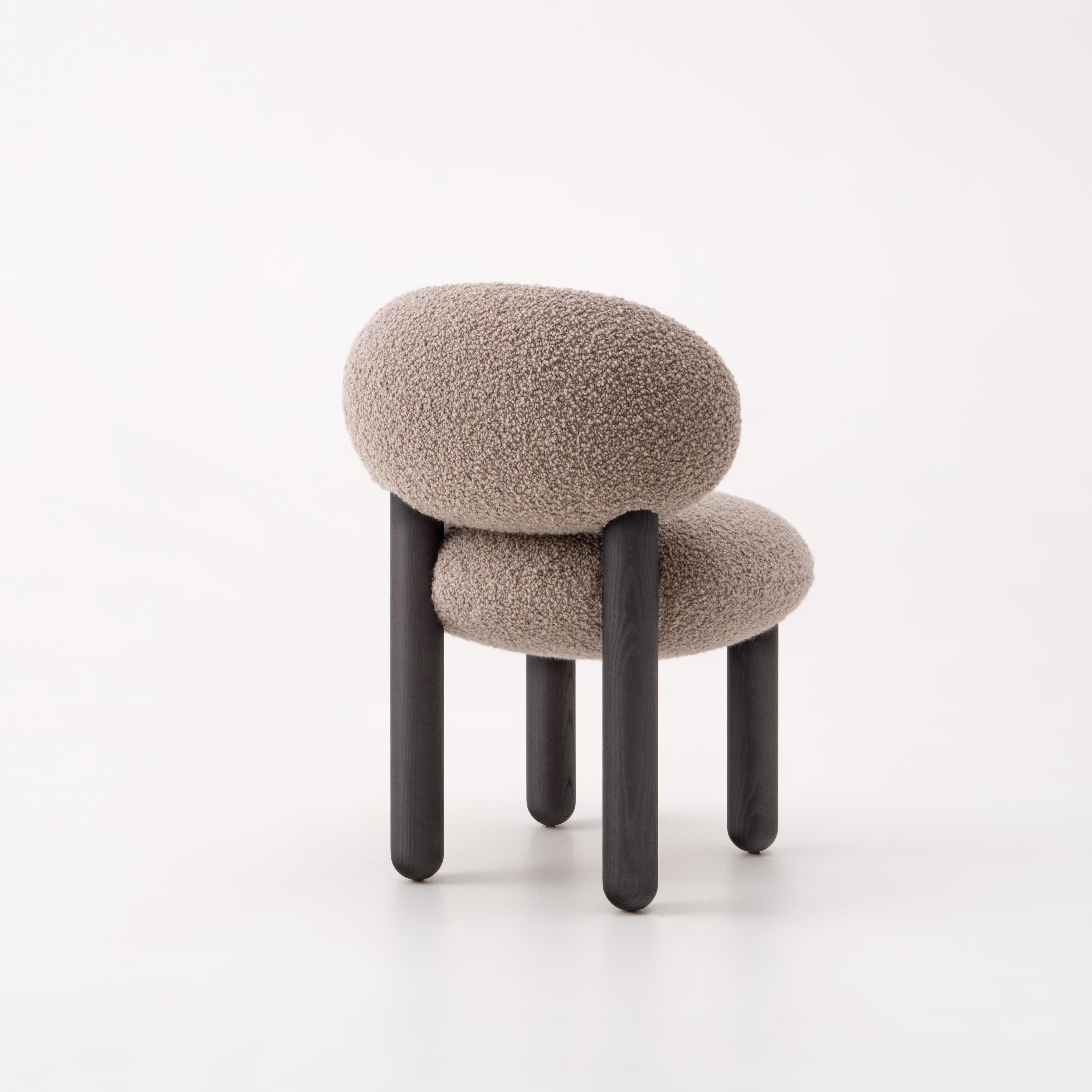 Dining Chair Flock CS2
Designer: Kateryna Sokolova for Noom

Model shown in the main pictures: 
Legs: black stained ashwood
Upholstery: Dedar, Nimbus col.03

The 
