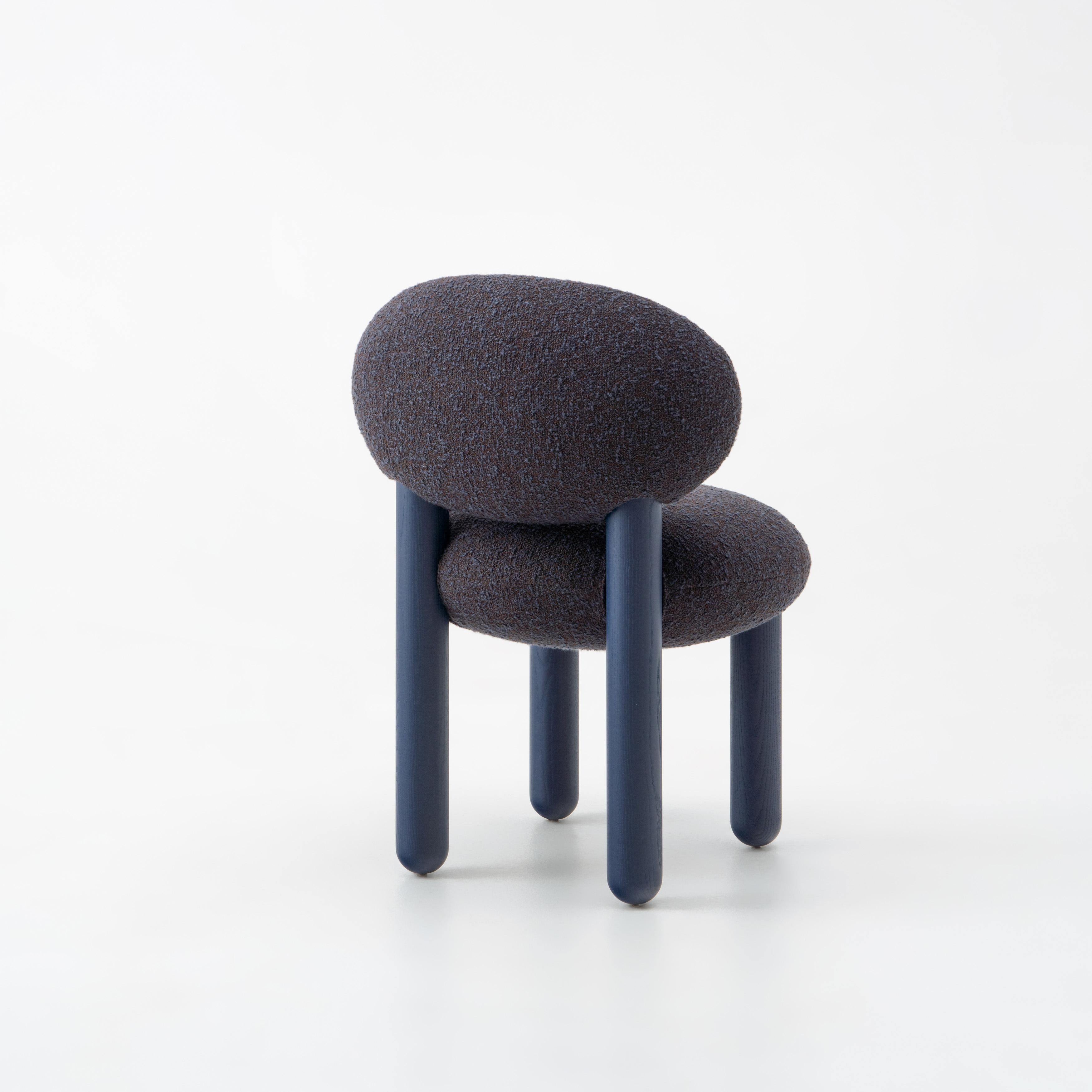 Dining Chair Flock CS2
Designer: Kateryna Sokolova for Noom

Model shown in the main pictures: 
Legs: blue stained ashwood
Upholstery: Kvadrat, Zero col.06

The 