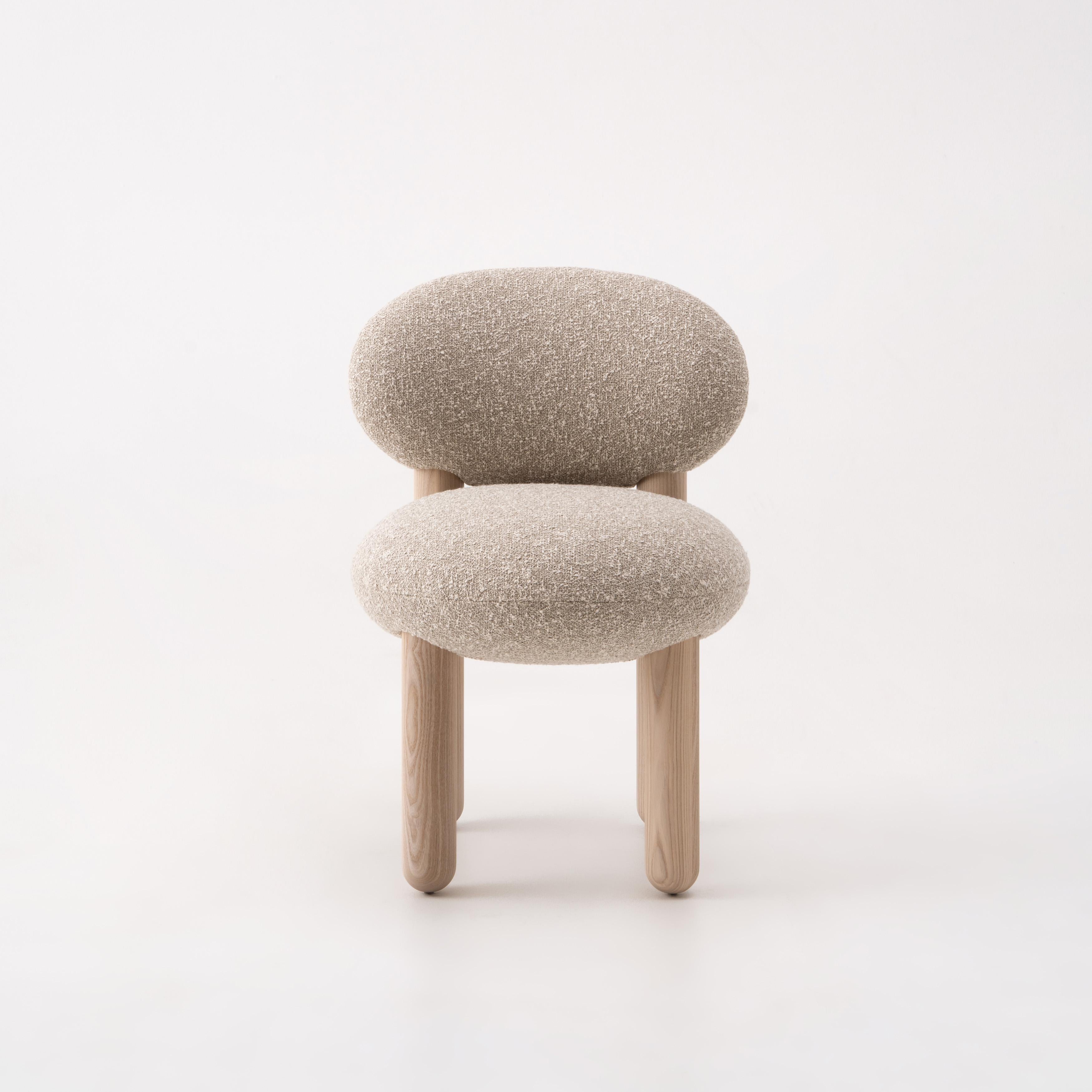 Dining Chair Flock CS2
Designer: Kateryna Sokolova for Noom

Model shown in the main pictures: 
Legs: natural light ashwood
Upholstery: Kvadrat, Zero col.12

The 