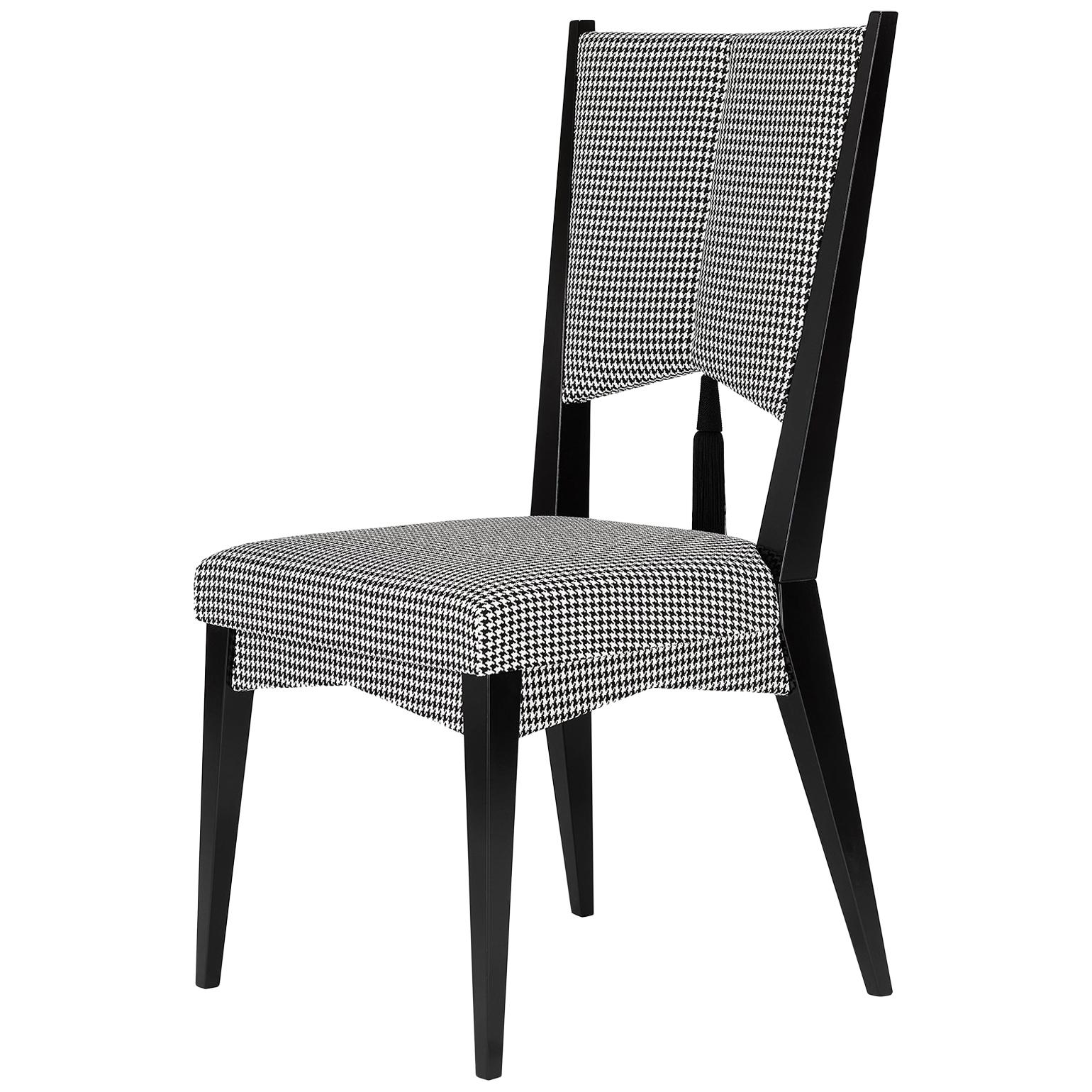 Black and white vintage fabric. An embroidered rose and a black tassel on the backrest give this chair its light feminine appeal. A minimalist structure, highlighted by a black design.
Solid beech structure with semi gloss black varnish. Except for