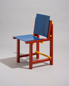 Modern contemporary chair in red blue yellow wood by Marc Morro