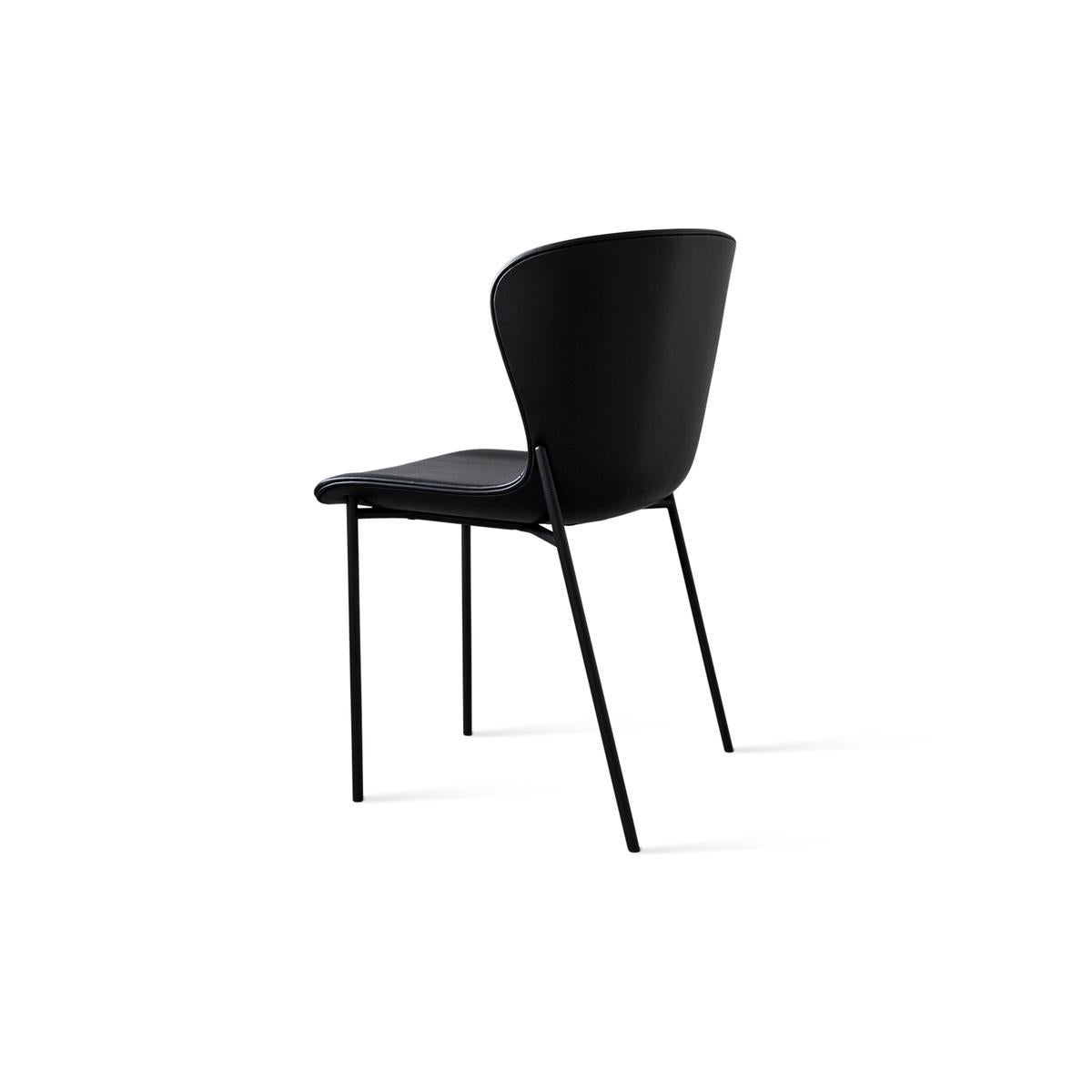 Pipe - chair 
Design: Friends & Founders
Model shown : 
Bolero CA-MO Black Leather
Legs: Black steel

Contemporary design studio Friends & Founders was founded in 2003 by Ida Linea and Rasmus Hilderbrand in Copenhagen, Denmark.
For this couple,