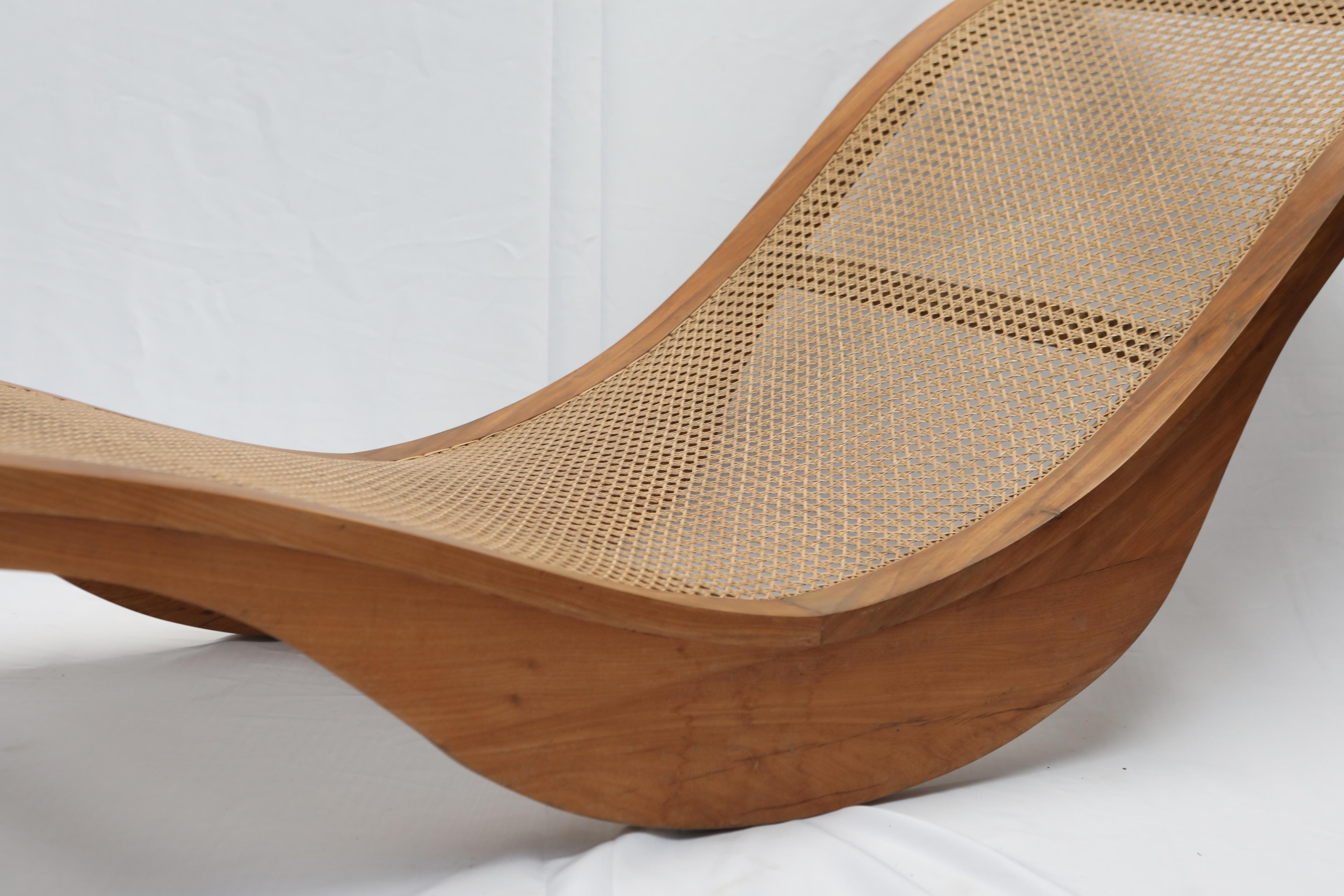 Beautiful chaise lounge by Igor Rodrigues done in Freijó wood with natural finish and seat in natural Indian straw. It is possible to have slight difference in the wood tone. 

 