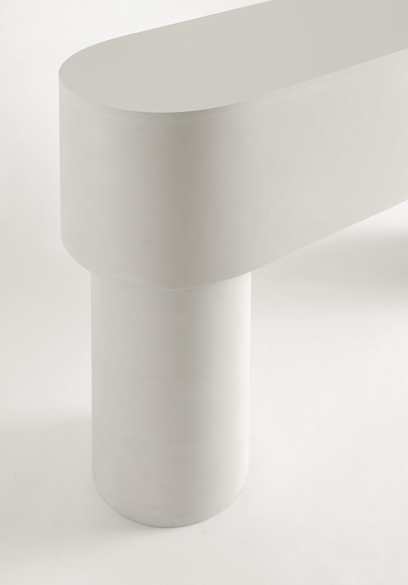Contemporary Jesmonite Console - Pilotis Console Table by Malgorzata Bany.

Inspired by support columns that lift a building above ground or water. Each piece is formed using a mould made of paper, used only once, making each piece unique. Available