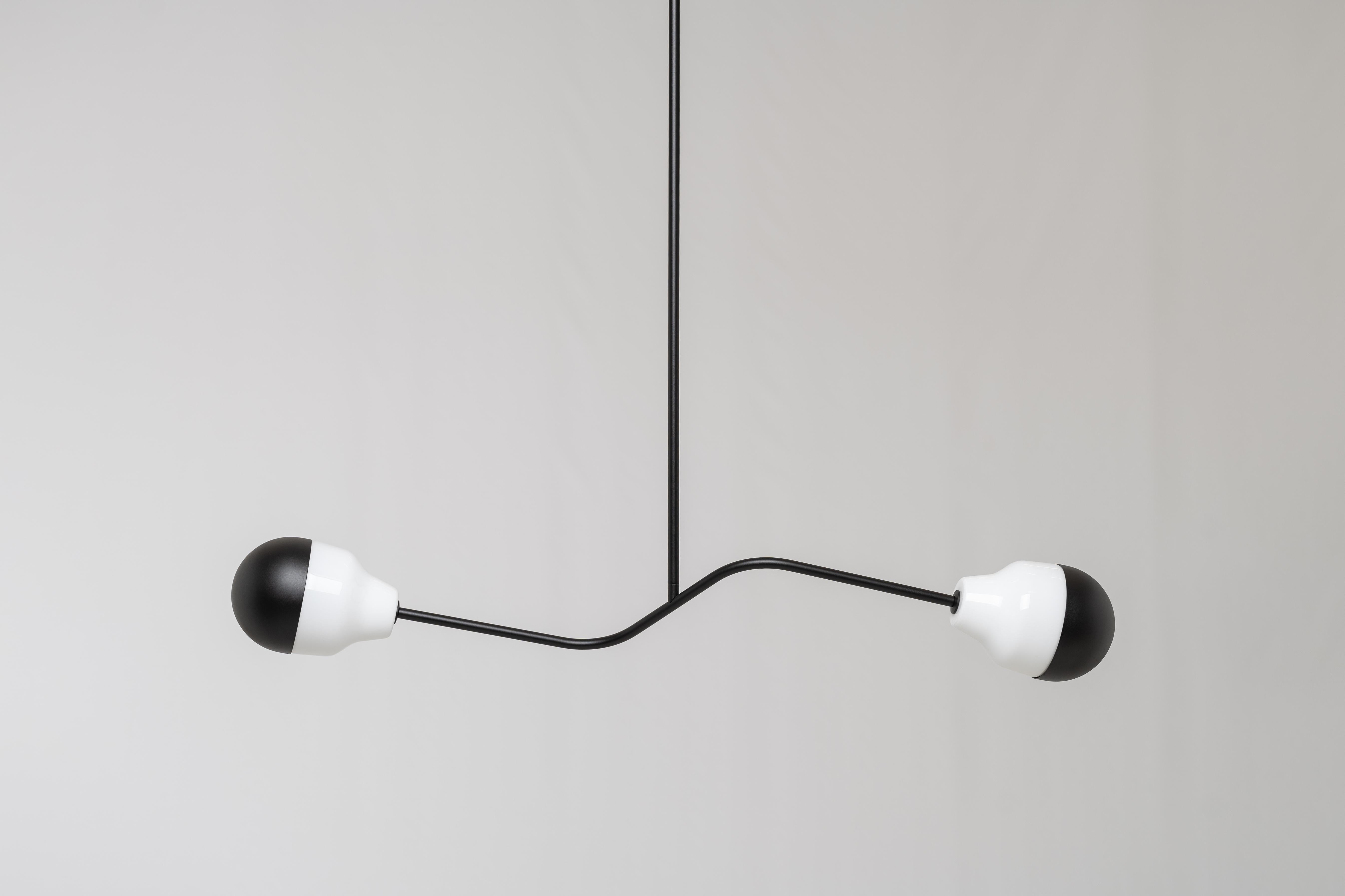 Ambiguo type-04 by Saarepera & Mae
Chandelier

Materials: Mouth-blown Murano glass / stainless steel and aluminum
Light source: Built-in LED 100-240V / Dimmable

Dimensions: 
L 126 cm / 49.6 in
W 17.5 cm / 6.9 in

Fixing: 
Hanging from a