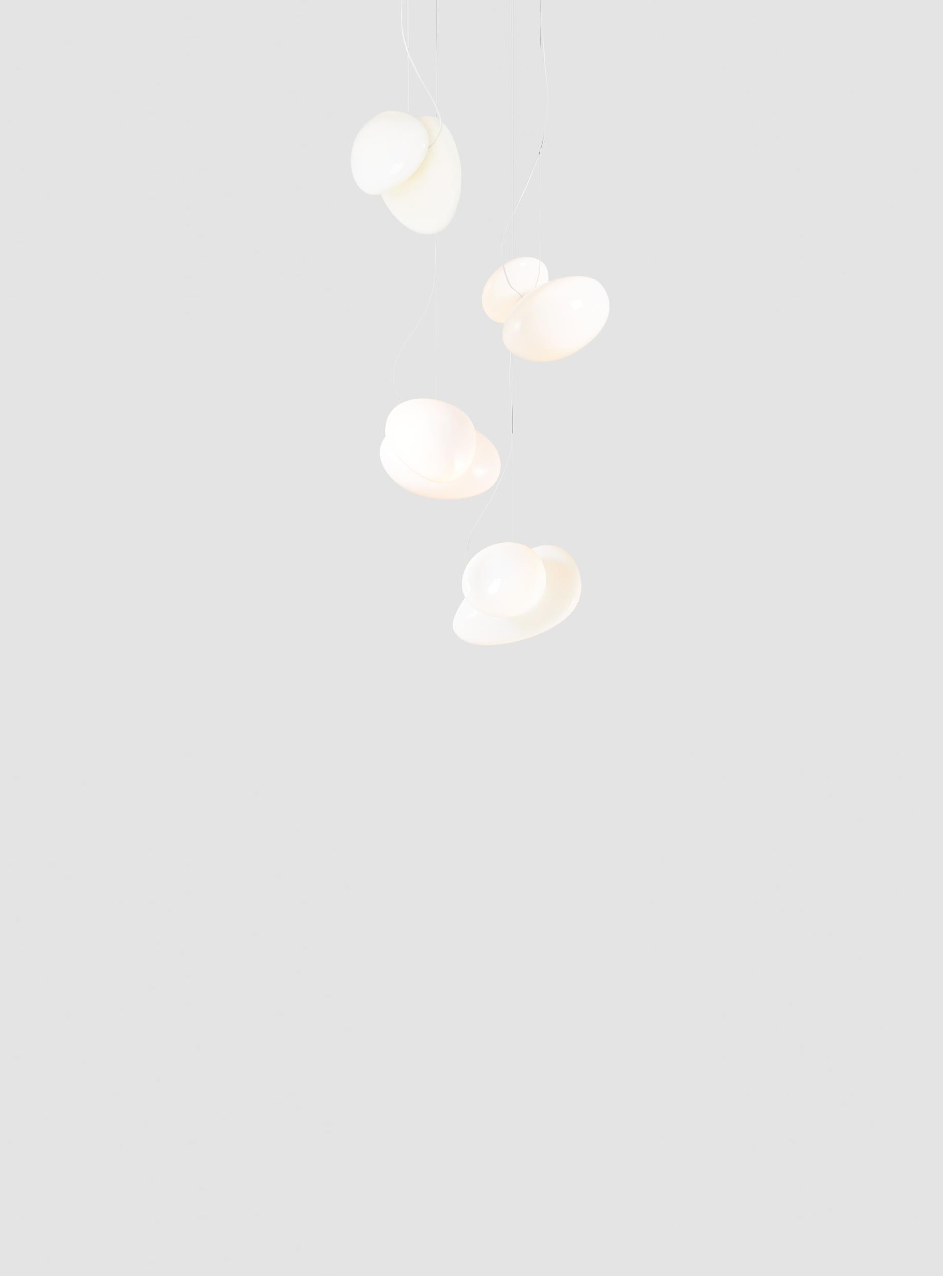 Contemporary chandelier Pebble 
Drop type: Cluster 

Electrical : 
Voltage: 110 – 277V / 220 – 240V
Integral LED source : 3 x 14W LED 39V

The model shown in picture:
Each pendant: Ø 35cm, 5kg
Canopy: Ø 69cm, 11kg
Color: white pearl