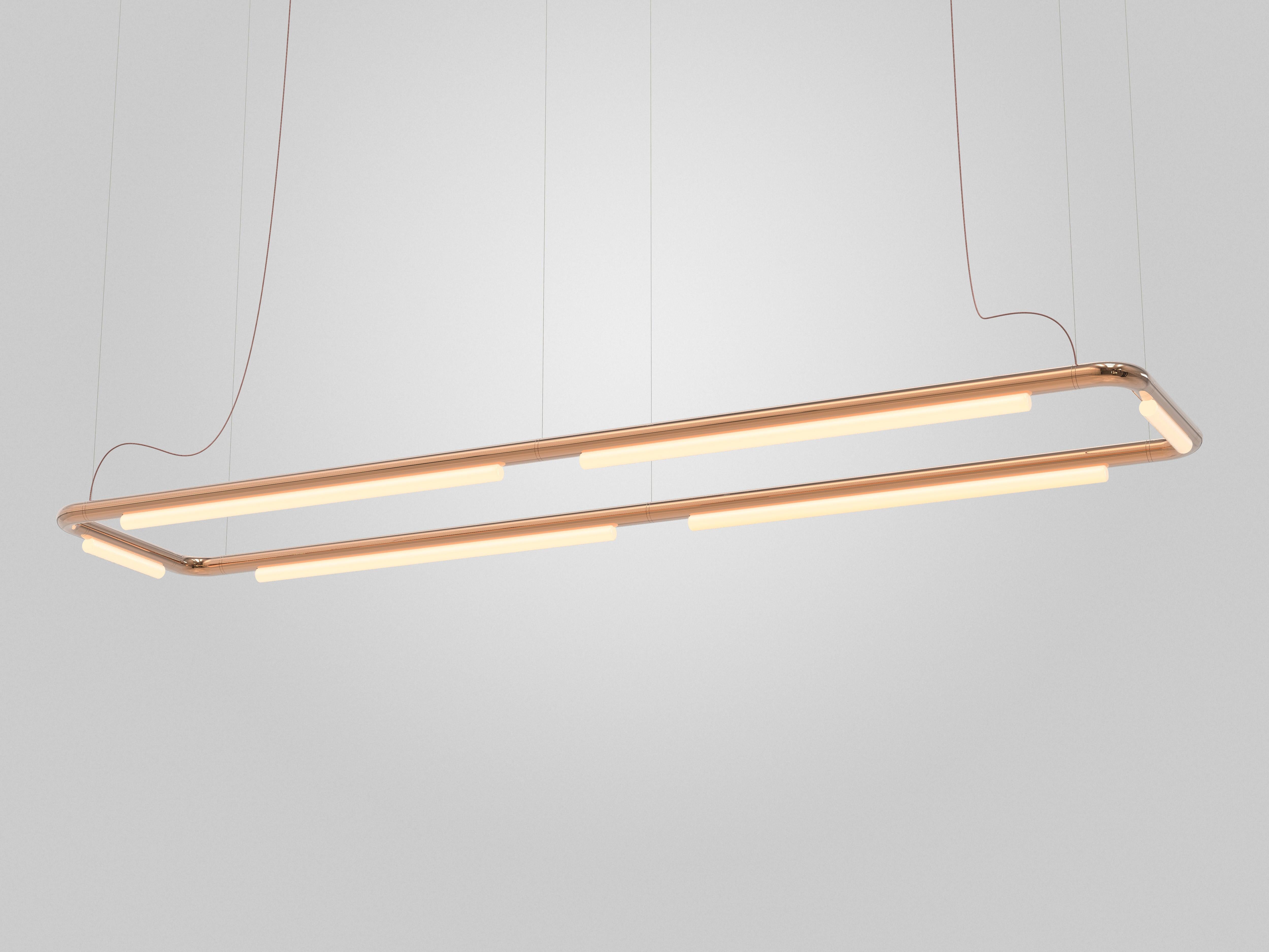 Pipeline pendant CM-8
Design: Caine Heintzman, Editor: AND Light

Materials
– Aluminum body
– Cast acrylic

Dimensions
267 x 62 x 7.5cm
105” x 24.5“ x 3”
Adjustable drop length: 243cm / 96”

Electrical
– 100–240V
– Dimming: ELV, 0-10, Dali
– From