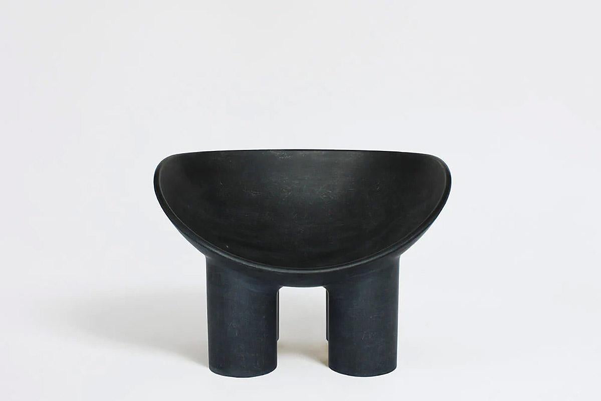 Contemporary fiberglass chair - Roly Poly Chair by Faye Toogood. This is shown in the charcoal fiberglass finish. 
Design: Faye Toogood
Material: Fiberglass 
Available also in cream or raw finish, please contact us.

The Roly Poly chair is the