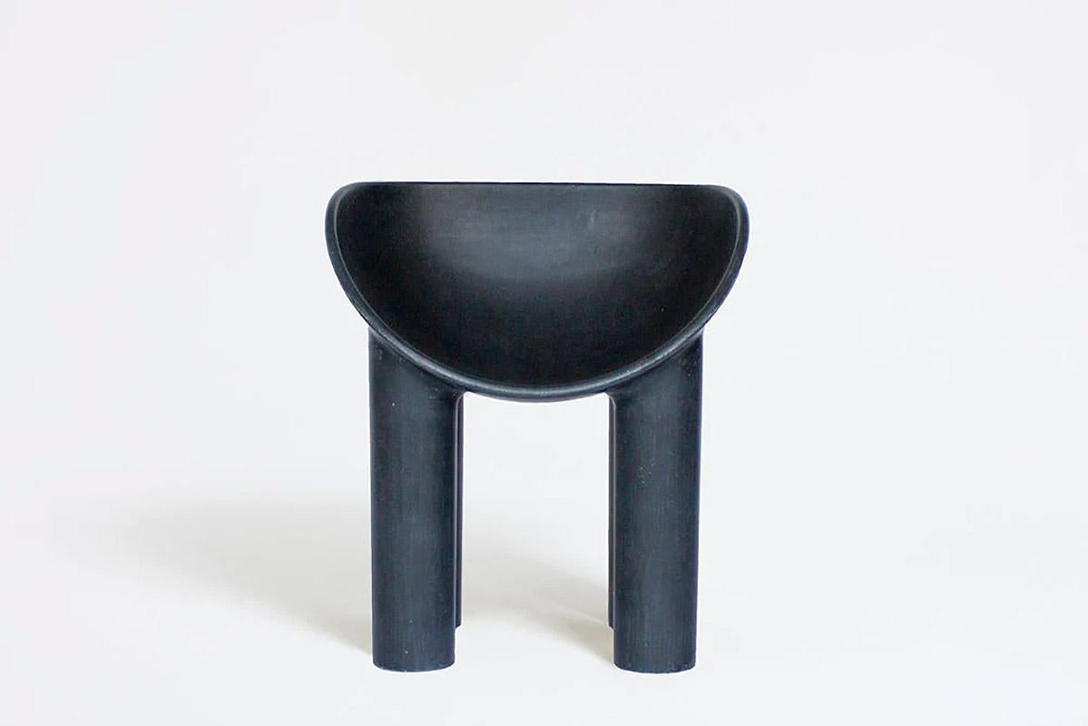 Contemporary fiberglass chair - Roly Poly Dining Chair by Faye Toogood. This is shown in the charcoal fiberglass finish. 
Design: Faye Toogood
Material: Fiberglass 
Available also in raw or cream finish, please contact us.

The Roly Poly chair