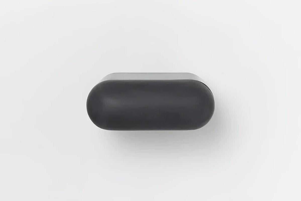 Contemporary wooden cantilever drawer, Roly-Poly by Faye Toogood
This is shown in the charcoal wooden finish. 

A self-contained drawer sculpted in a curvilinear form. The runners are engineered to slide to a gentle close.

This product is