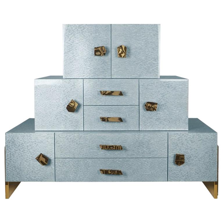 Contemporary Chest of Drawers in Blue Bird Eye Stained Wood Leaf & Brass Details For Sale